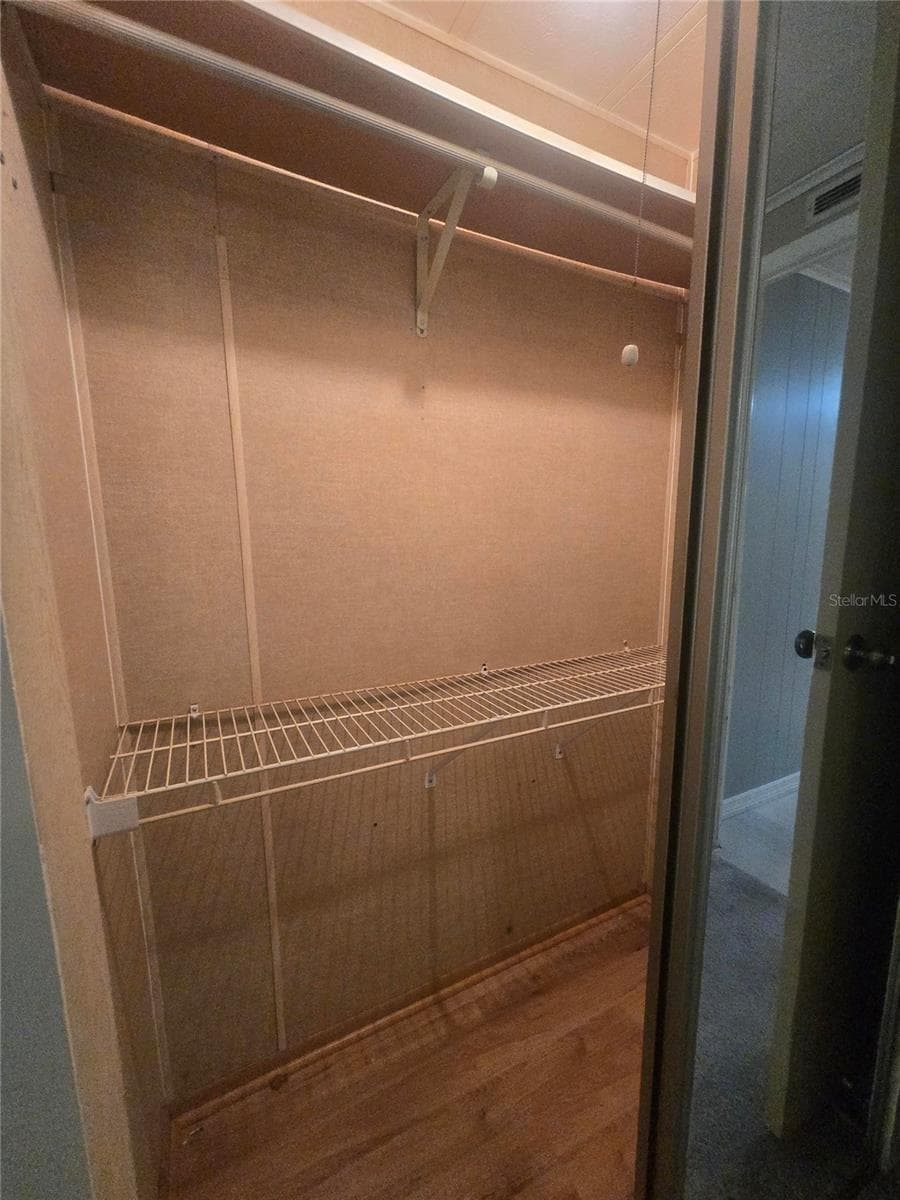 /second primary closet - 4645 BURNEY DR, HOLIDAY