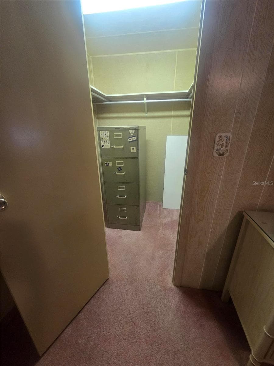 Bedroom 1 walk-in closet - 4645 BURNEY DR, HOLIDAY