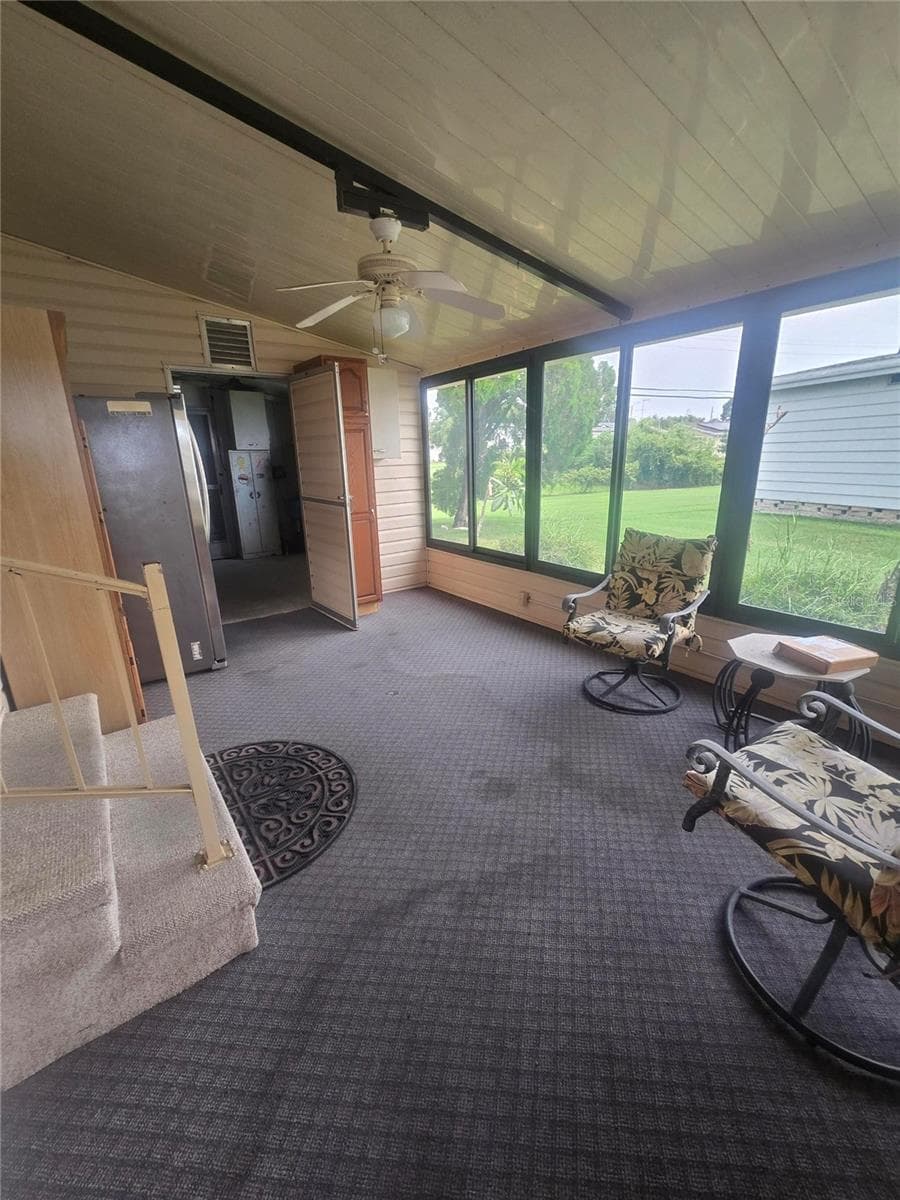 Porch/patio with vinyl windows - 4645 BURNEY DR, HOLIDAY