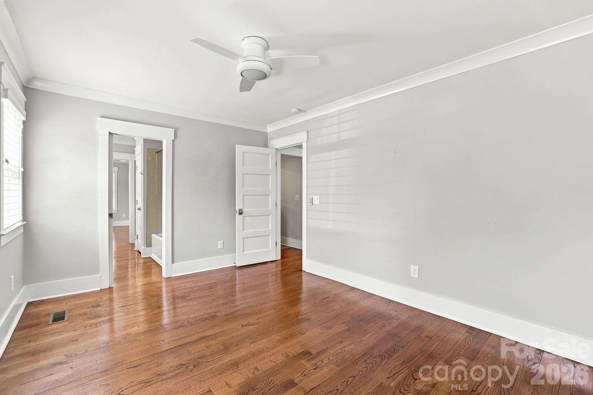 One of two bedrooms on main level. - 2617 Commonwealth Avenue, Charlotte
