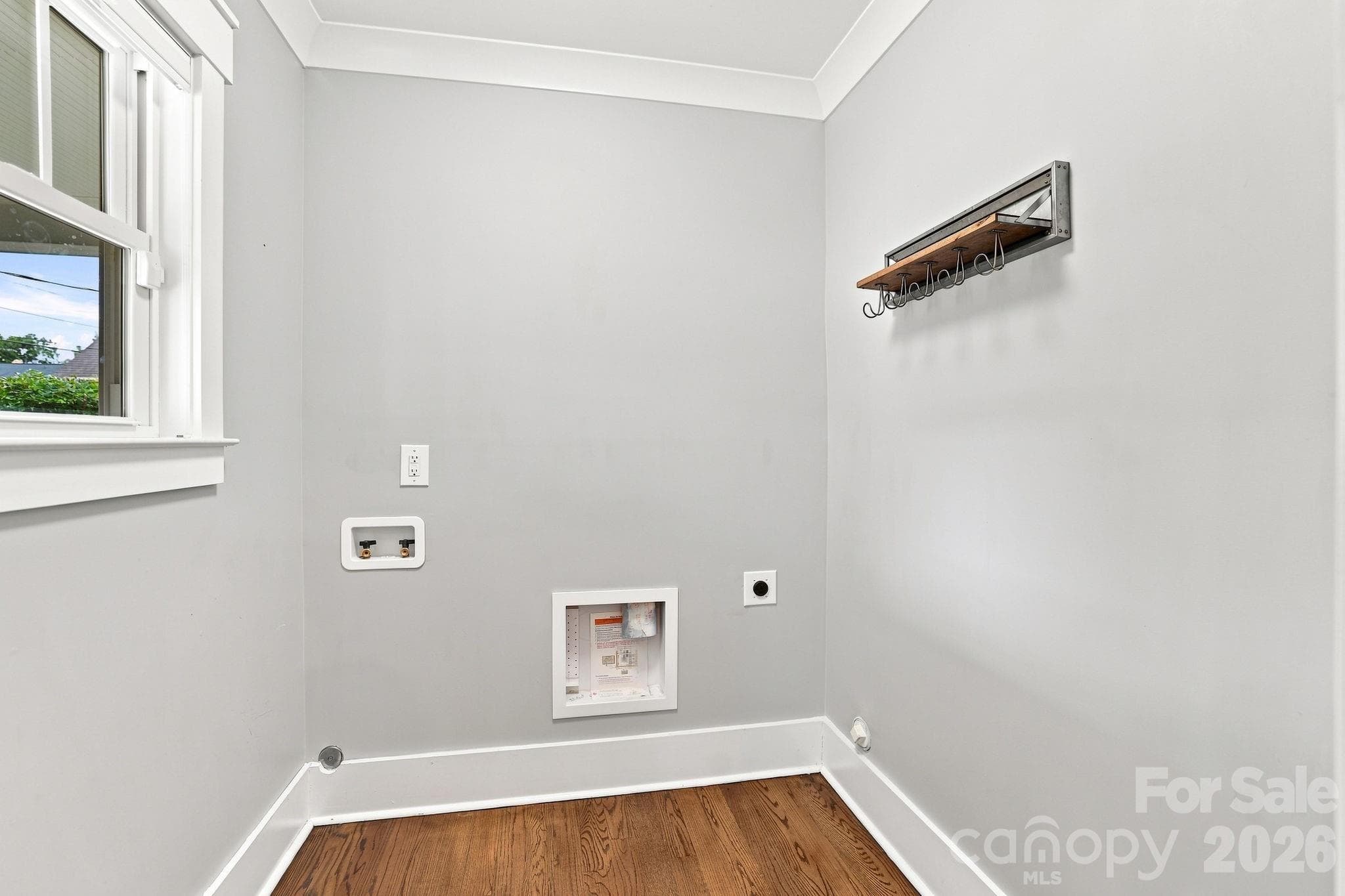 Kitchen pantry and one of two laundry rooms. - 2617 Commonwealth Avenue, Charlotte
