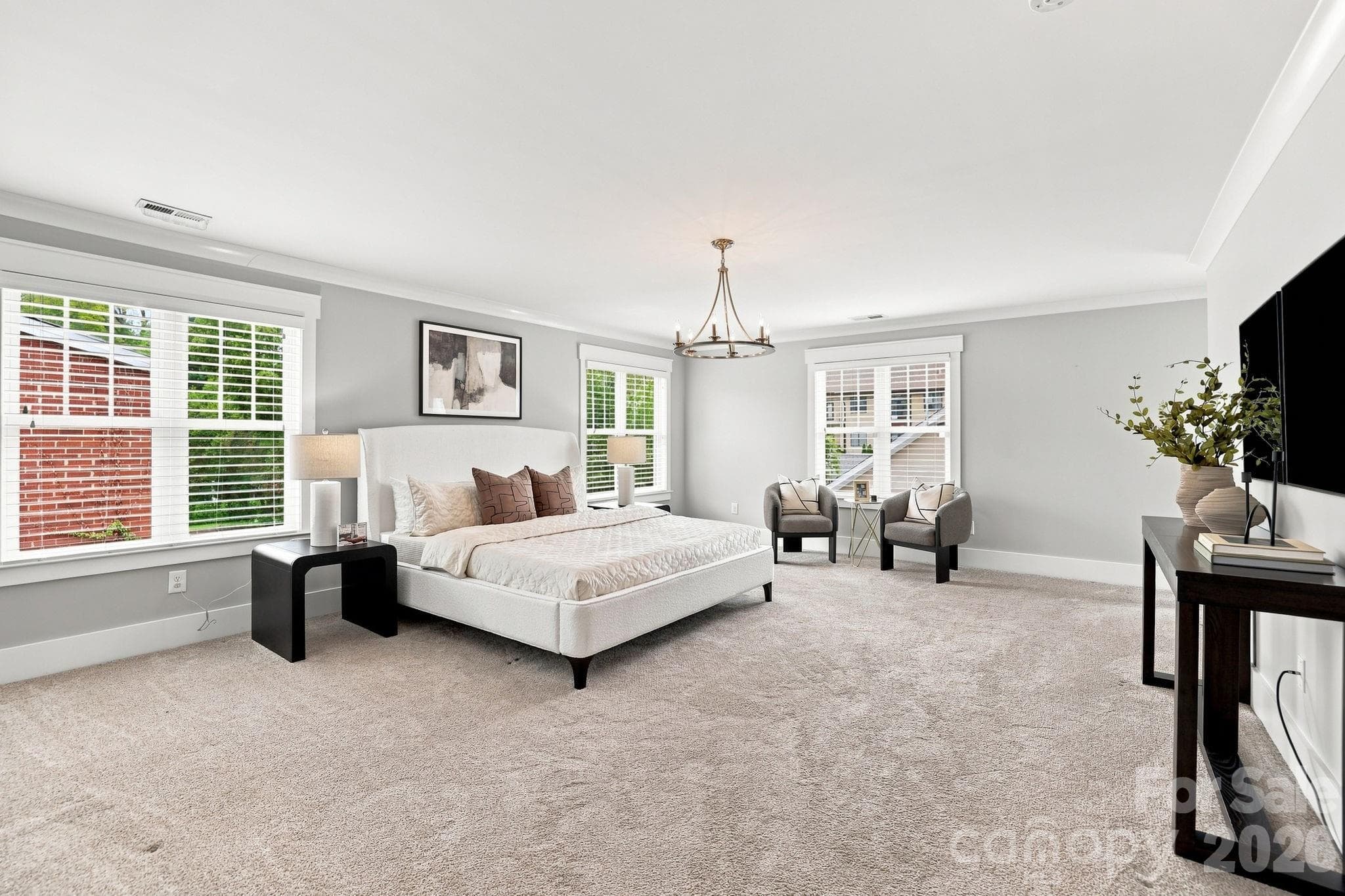 Primary bedroom on main level. - 2617 Commonwealth Avenue, Charlotte
