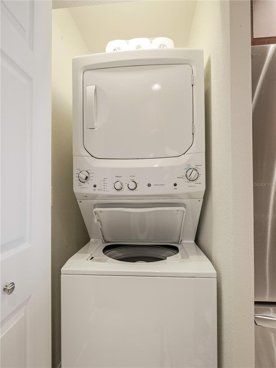 washer/dryer in kitchen - 452 BOUCHELLE DR #204, NEW SMYRNA BEACH