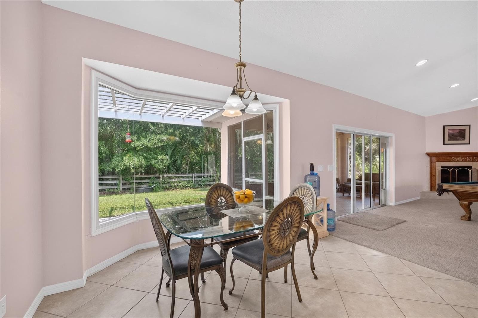 Breakfast Nook with 9 Ft Frameless Panoramic Window - 19040 NW 88TH AVENUE RD, REDDICK
