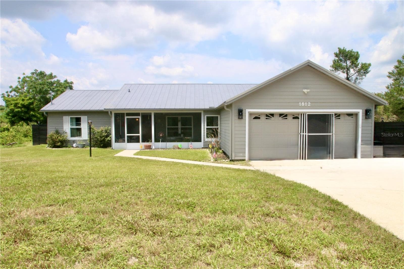 Main Front - 1812 WHIPPLE DR, DELTONA