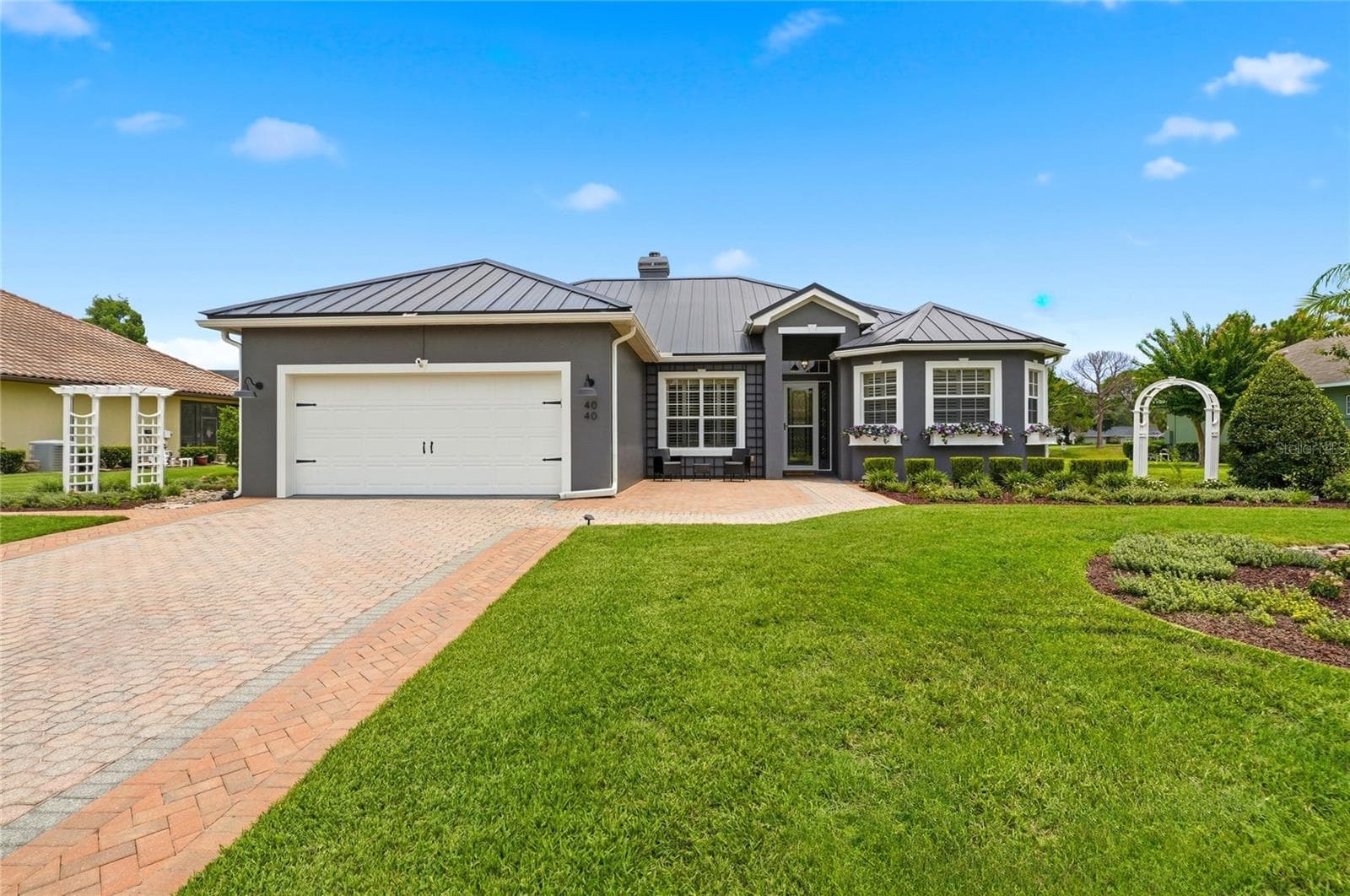 Paver Driveway & Lush Lawn - 4040 PALMA CEIA CIR, WINTER HAVEN