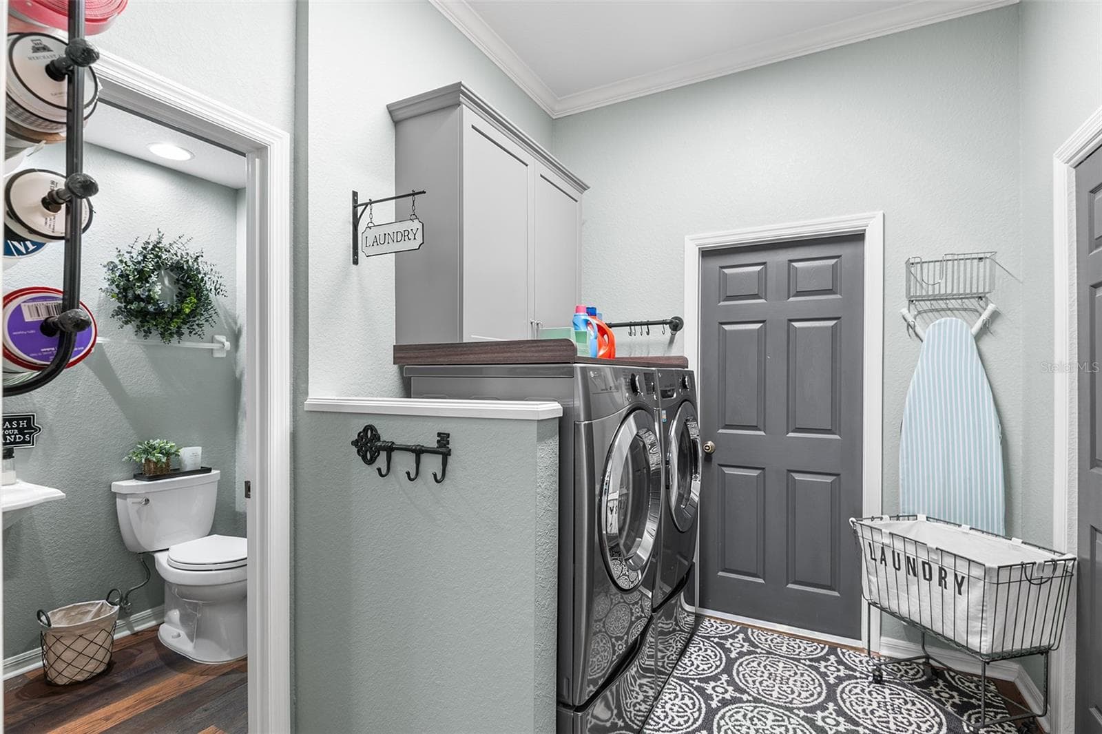 Kitchen Closet Pantry on Right & Door to Garage Straight Ahead - 4040 PALMA CEIA CIR, WINTER HAVEN