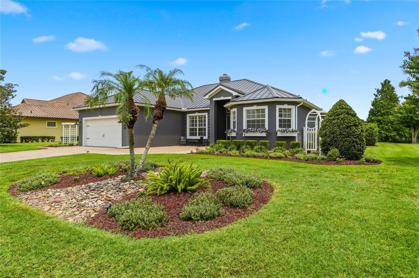 Lush Landscaping Throughout the Yard - 4040 PALMA CEIA CIR, WINTER HAVEN