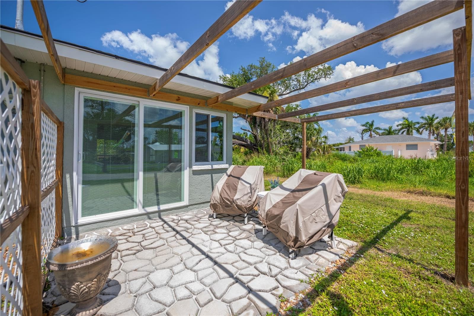 Open air deck (pergola has been removed since photos were taken) - 8152 SEASHELL ST, ENGLEWOOD