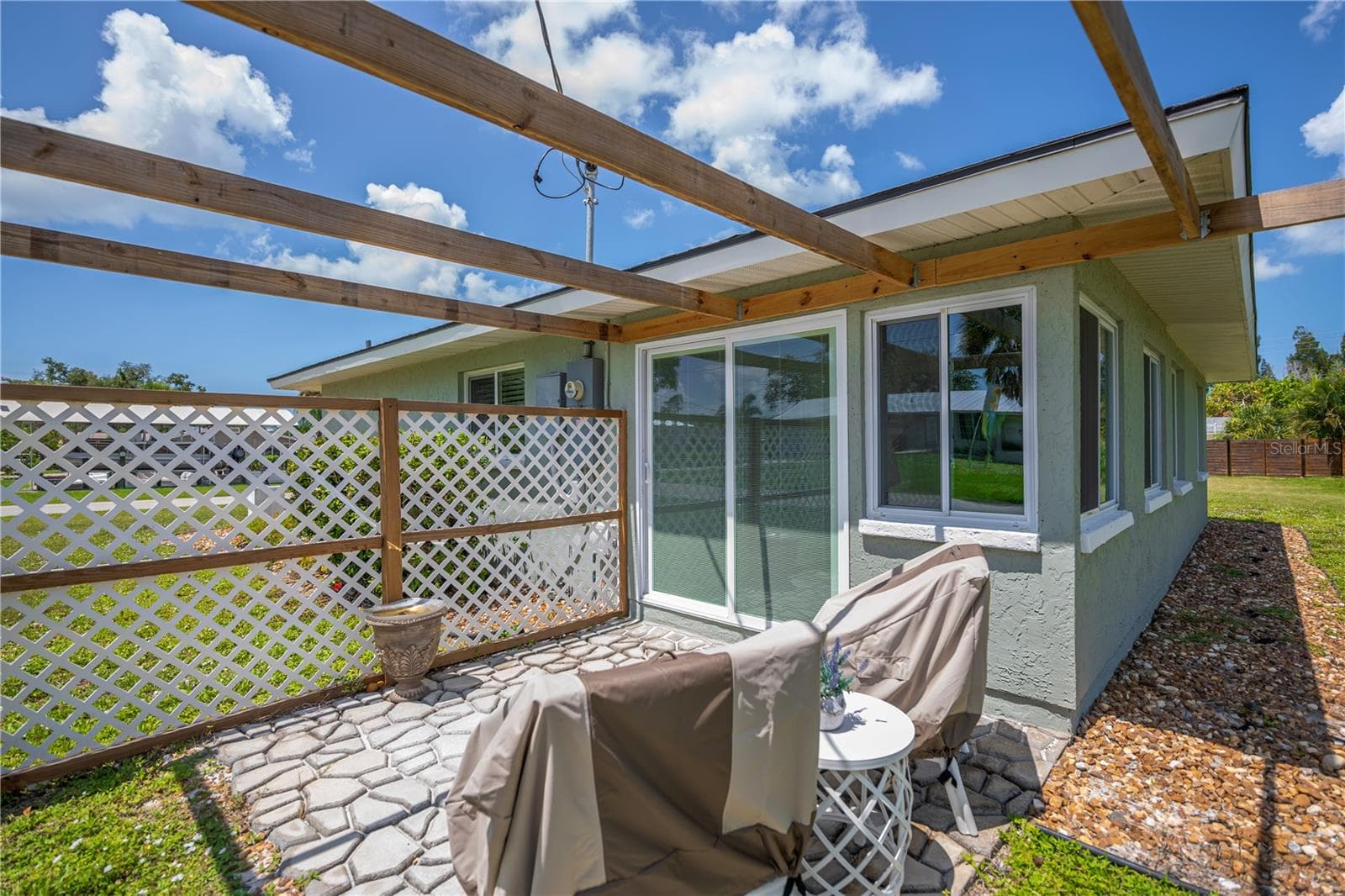 Open air deck (pergola has been removed since photo was taken) - 8152 SEASHELL ST, ENGLEWOOD