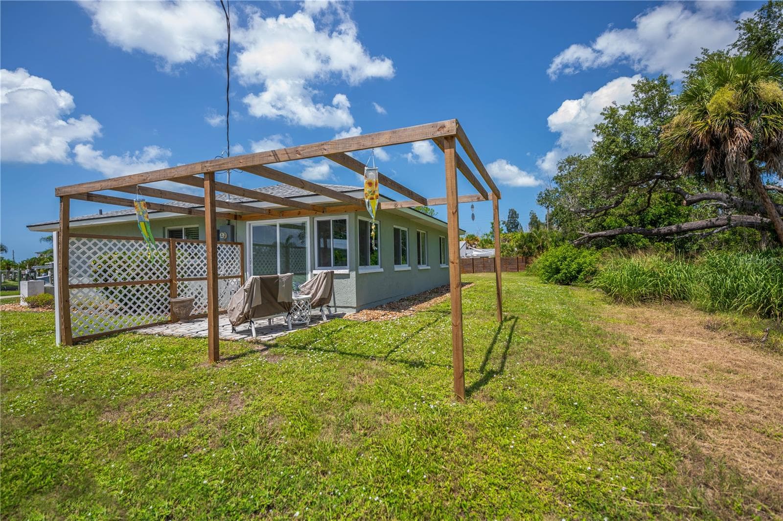 Open air deck (pergola has been removed since photos were taken) - 8152 SEASHELL ST, ENGLEWOOD