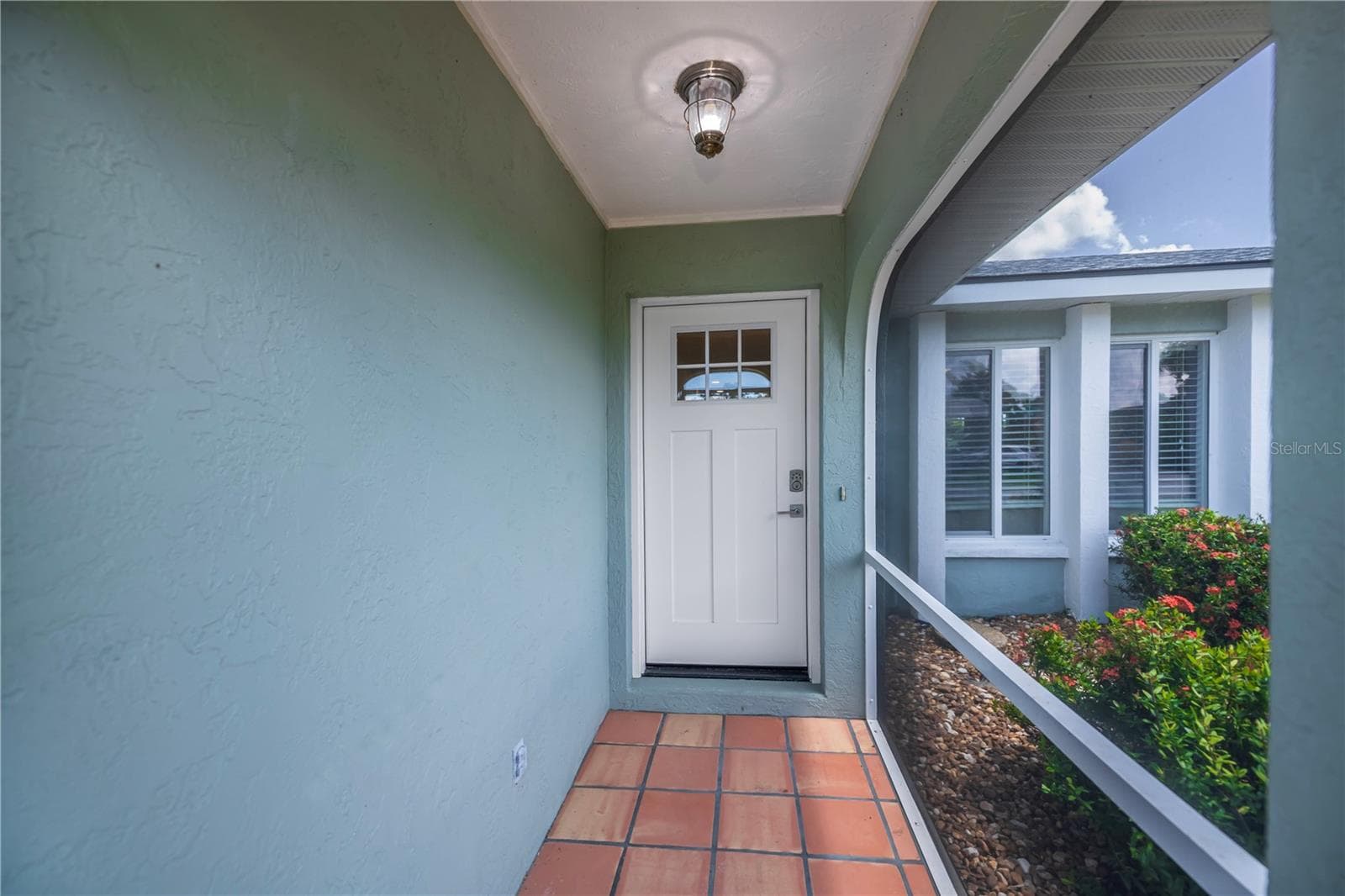 Front screened patio into the home - 8152 SEASHELL ST, ENGLEWOOD