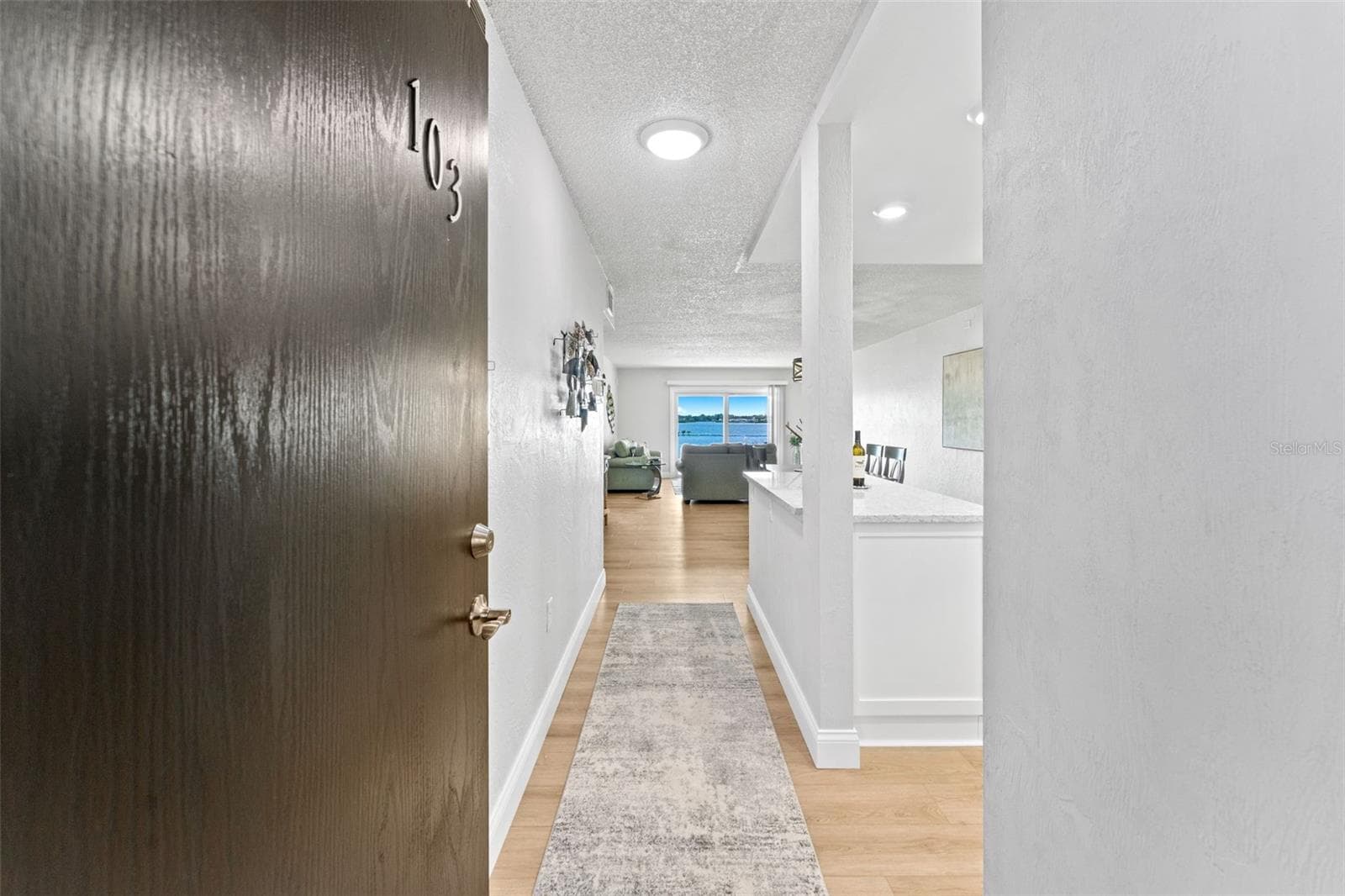 Welcome & come on in to unit #103- no elevators or stairs needed. - 3606 S PENINSULA DR #103, PORT ORANGE
