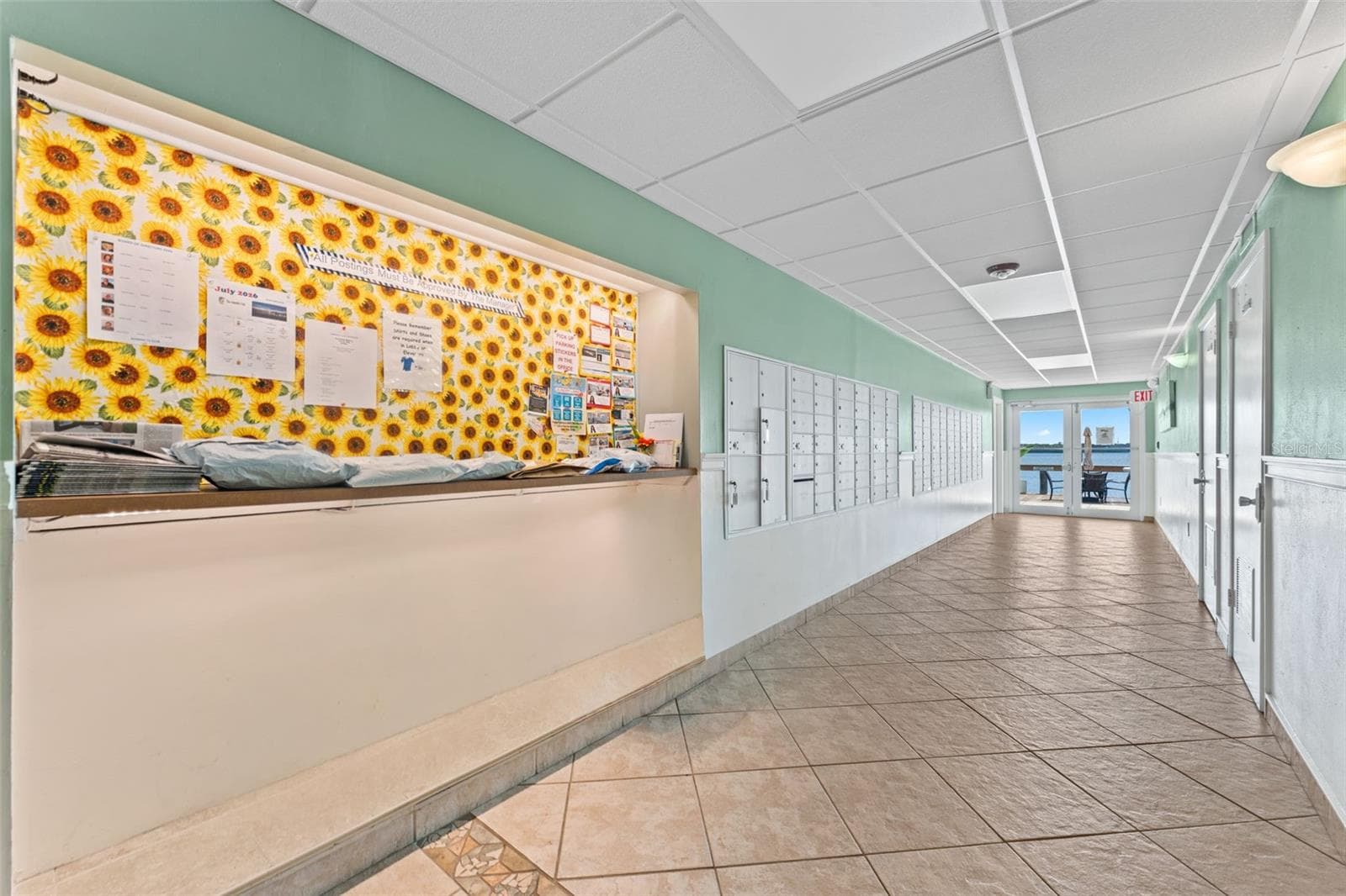 Community bulleting board and mail area - 3606 S PENINSULA DR #103, PORT ORANGE