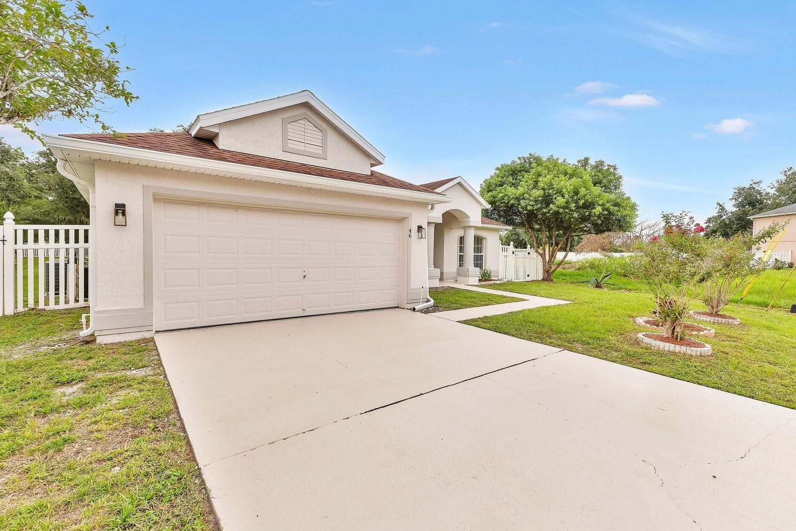 Roomy 2 car garage with new garage door opener - 46 CORDONA DR, KISSIMMEE