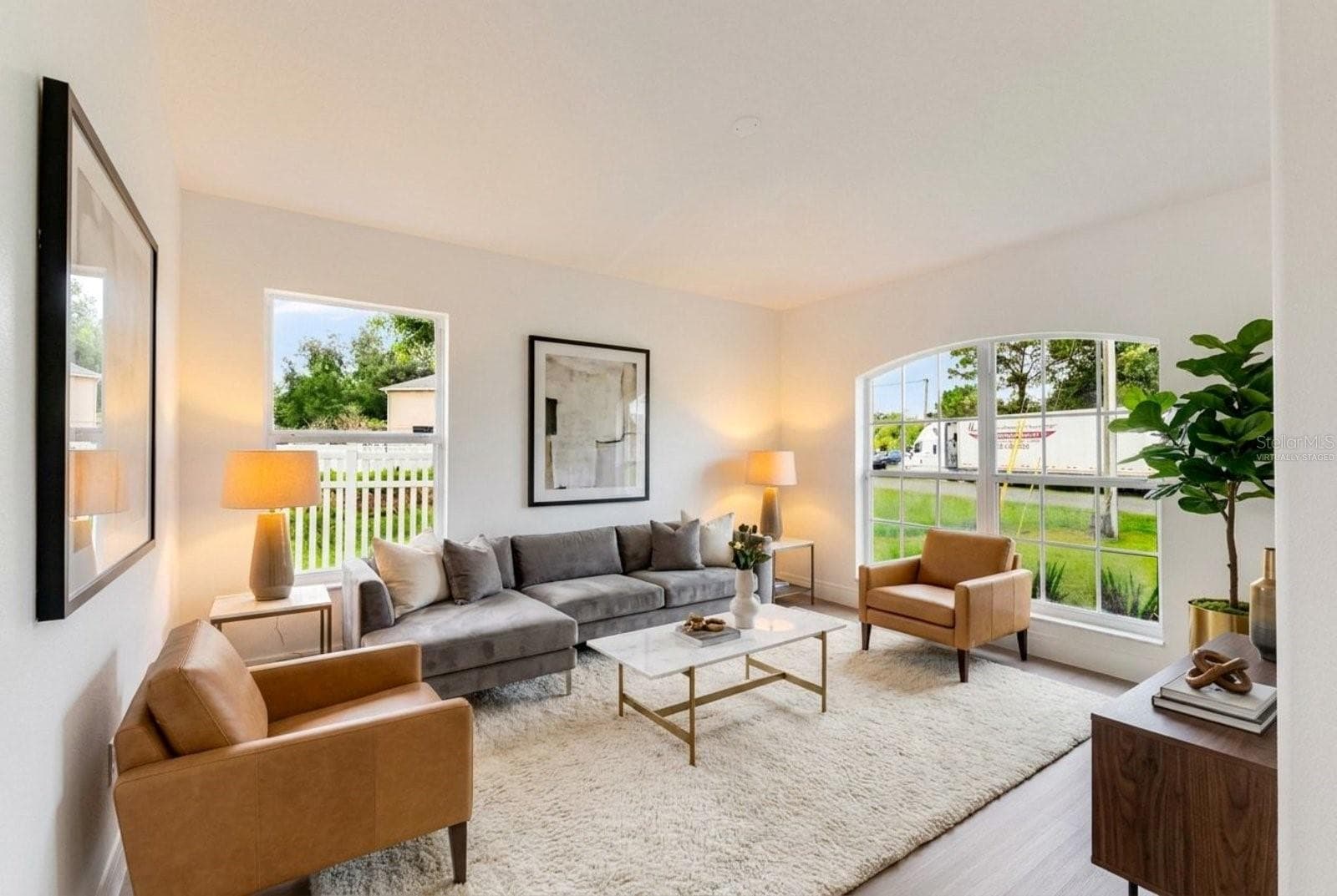 virtually staged Living Room in the front of the home - 46 CORDONA DR, KISSIMMEE