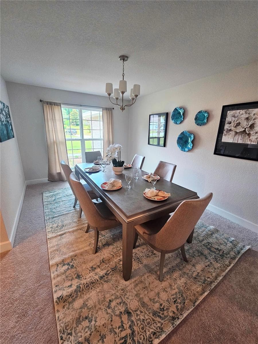 Stock photo staged model. Finished home will have different colors and finishes. Furniture not included - 133 SW BELLFLOWER DR, LAKE CITY