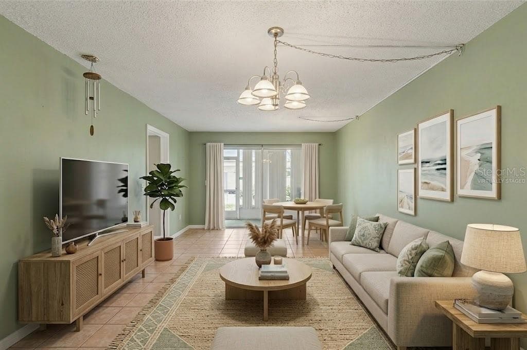 Virtually Staged Living and Dining - 4800 LAKE VILLA DR, CLEARWATER