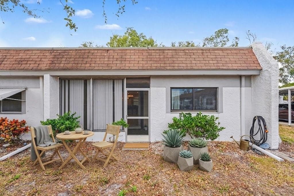 Virtually Staged Backyard - 4800 LAKE VILLA DR, CLEARWATER