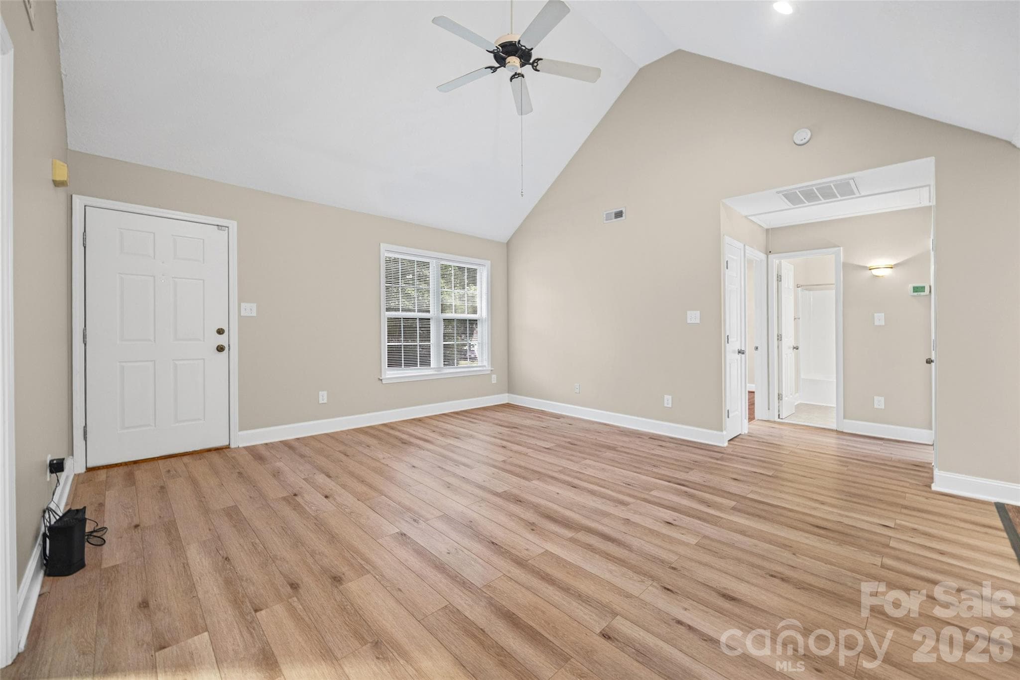 Livingroom view showing entry to secondary bedrooms and bath - 5408 Mallard Lane, Gastonia