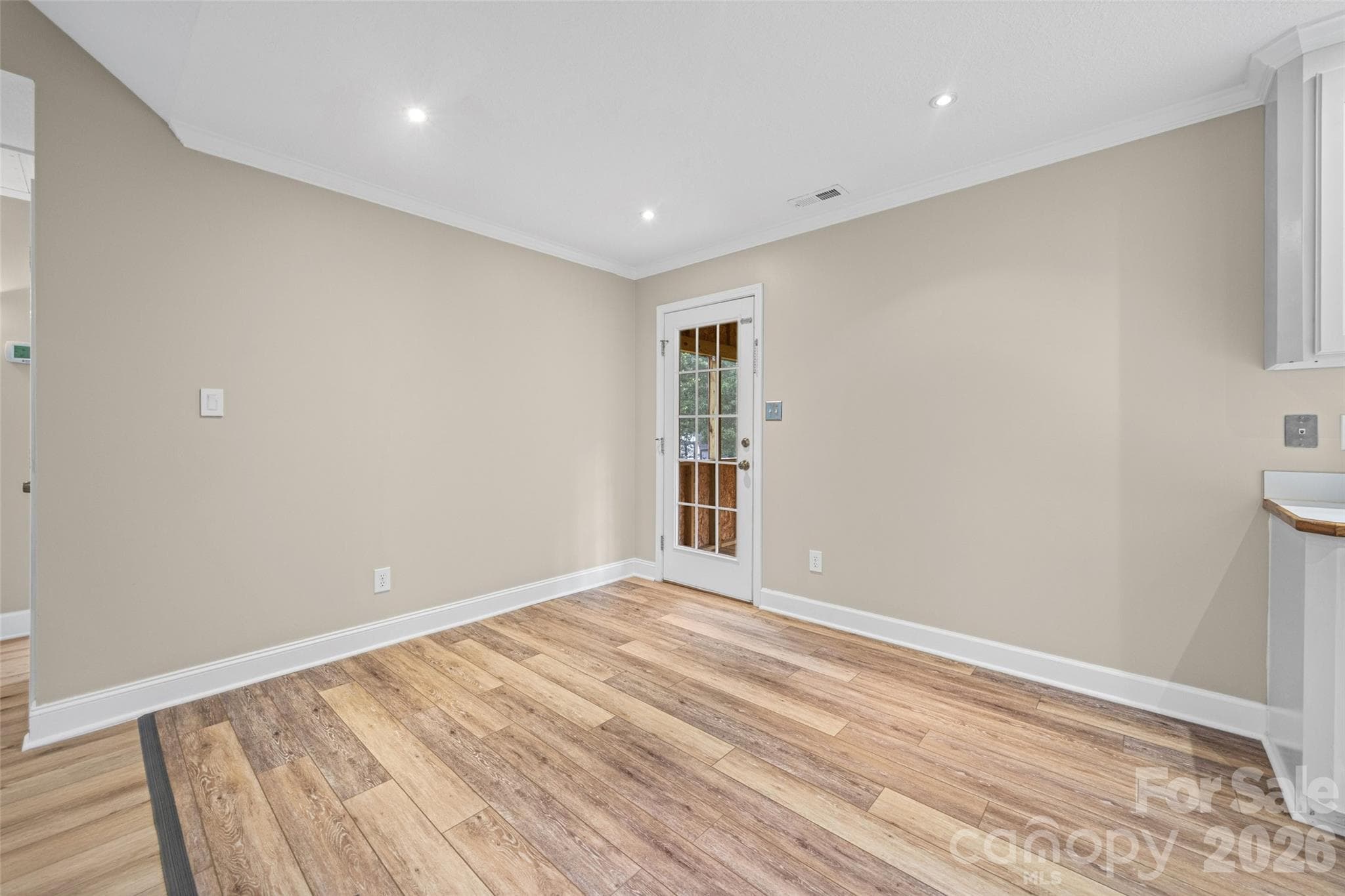 Dinging area and door to cover rear deck - 5408 Mallard Lane, Gastonia