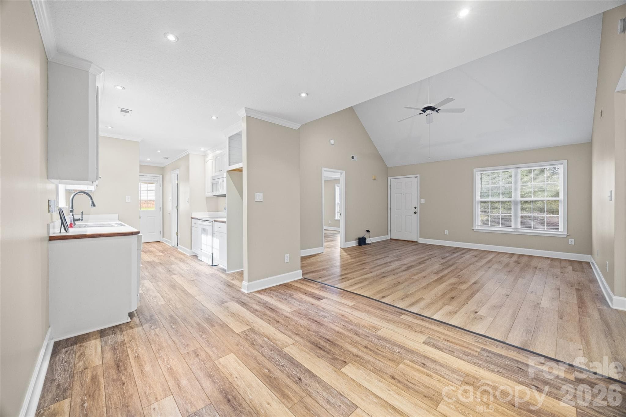 View from dining area showing kitchen and livingroom - 5408 Mallard Lane, Gastonia