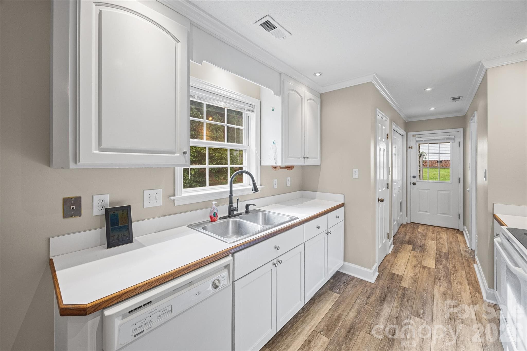 Kitchen view showing entry to carport - 5408 Mallard Lane, Gastonia