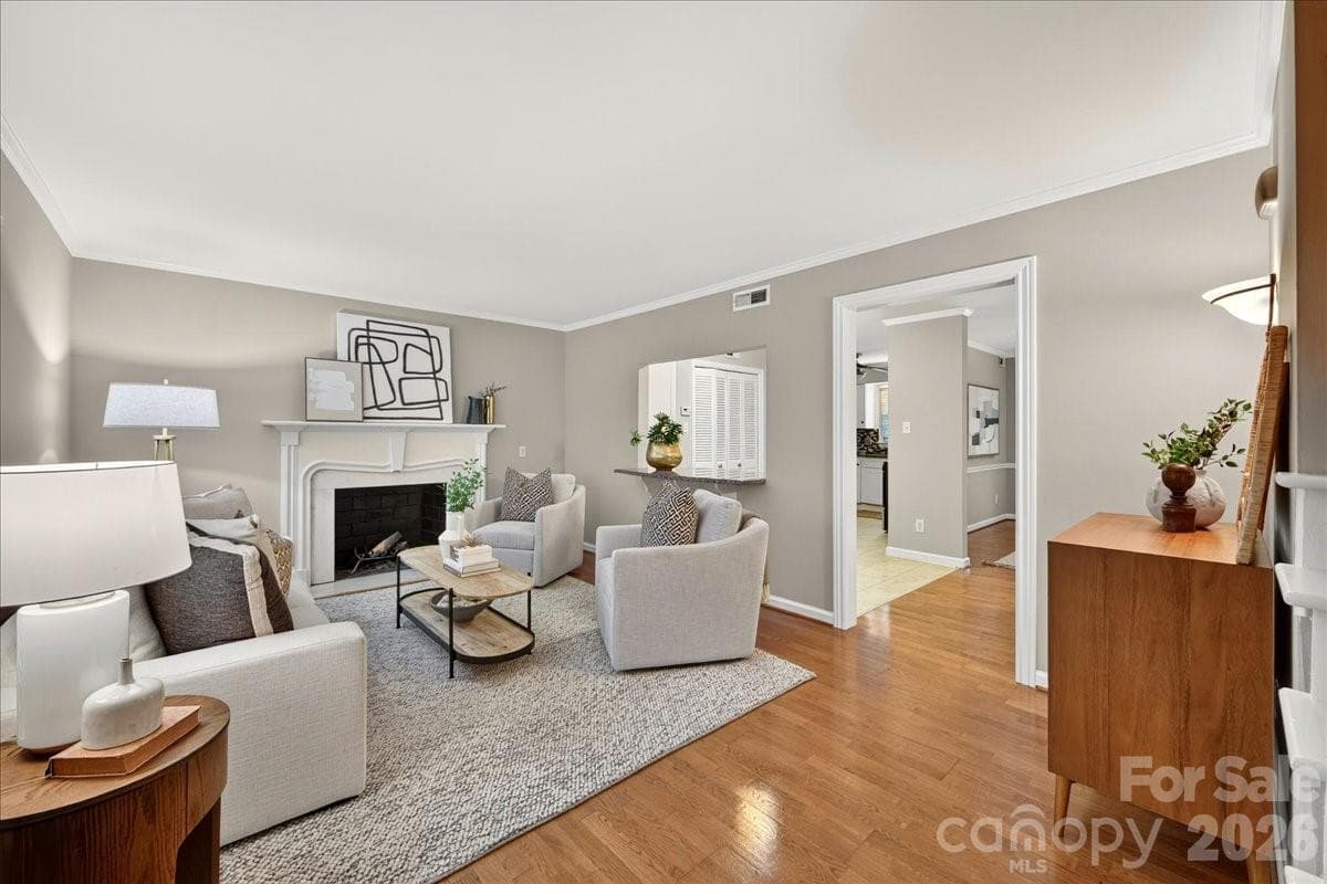 Living room with fireplace - 1700 Roxborough Road, Charlotte