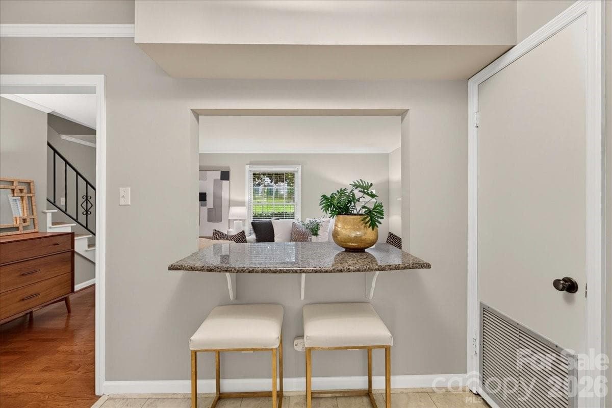 Breakfast bar, overlooking the Living Room - 1700 Roxborough Road, Charlotte