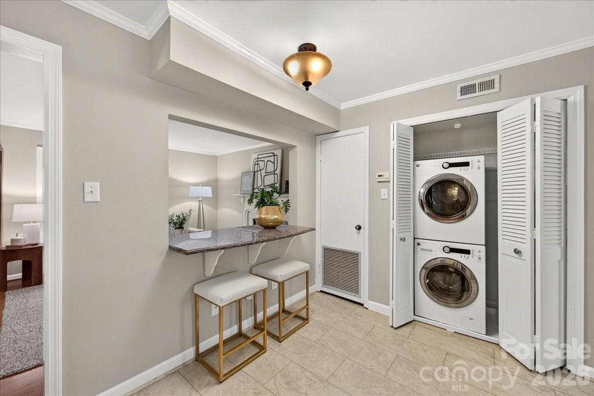Stackable washer and dryer remain - 1700 Roxborough Road, Charlotte