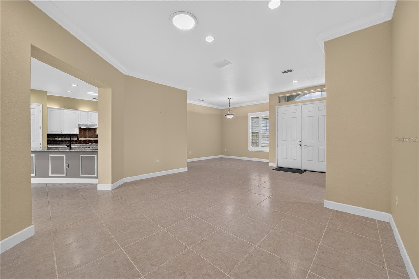 formal living room & formal dining room - 13500 SE 97TH TERRACE RD, SUMMERFIELD