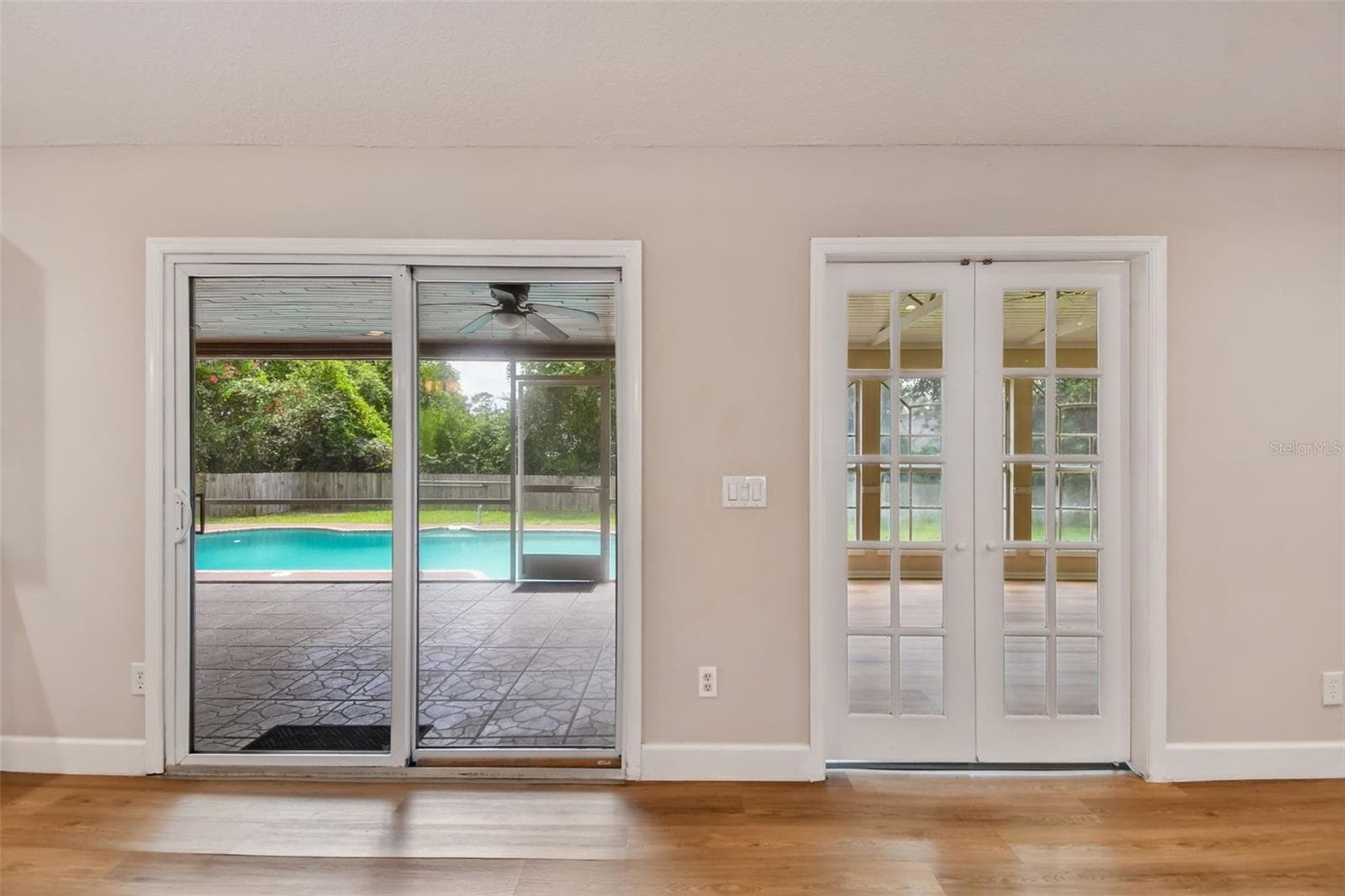 Great Room overlooking enclosed Bonus Room, Enclosed Porch, and Pool. - 755 KEENELAND PIKE, LAKE MARY