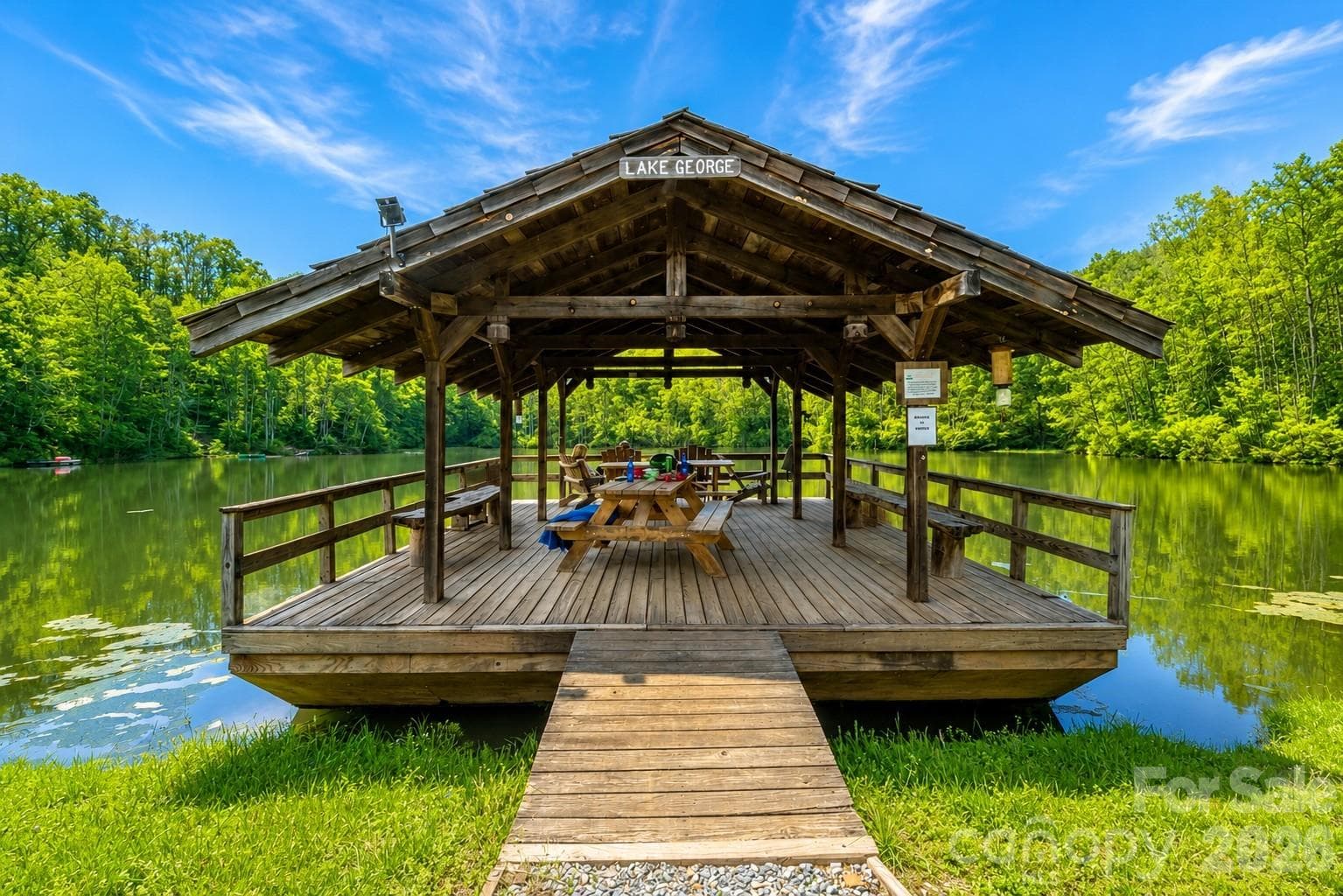 The family will love the floating dock on Lake George. - 771 Sally Gap Road, Old Fort