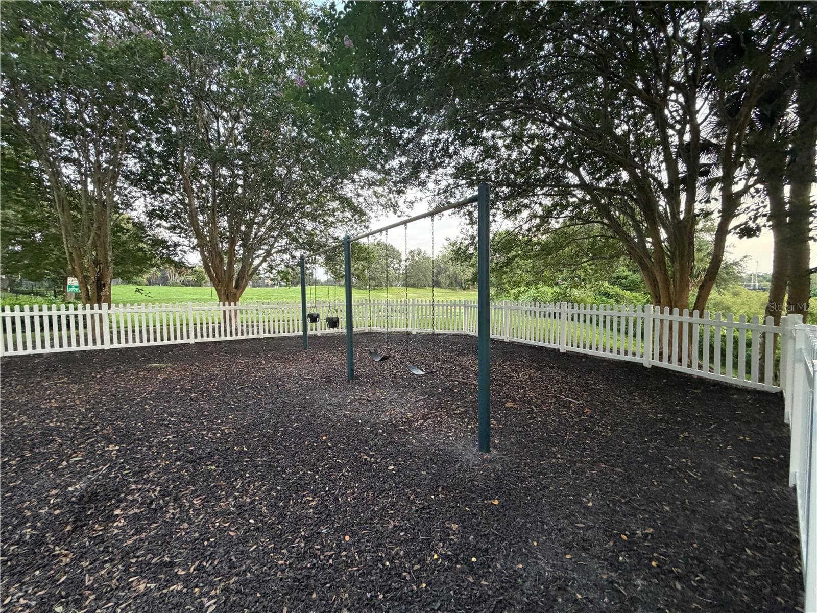Swing set area overlooking the park. - 483 VIA TUSCANY LOOP, LAKE MARY
