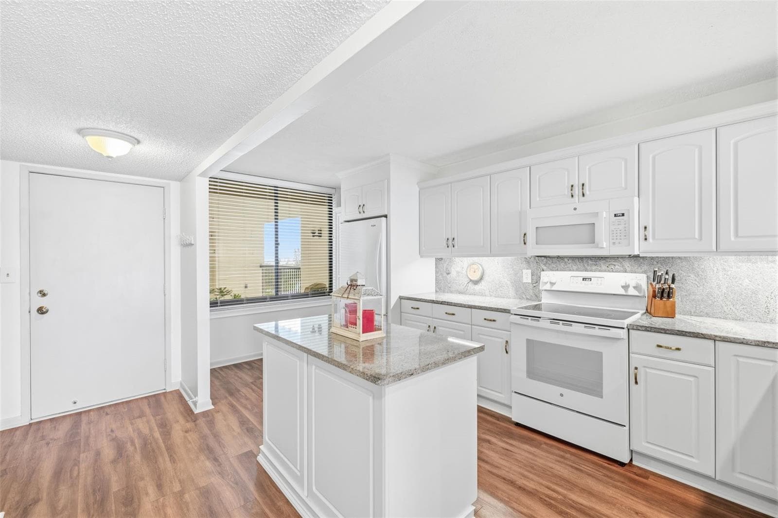 Entryway and Kitchen - 9425 BLIND PASS RD #705, ST PETE BEACH