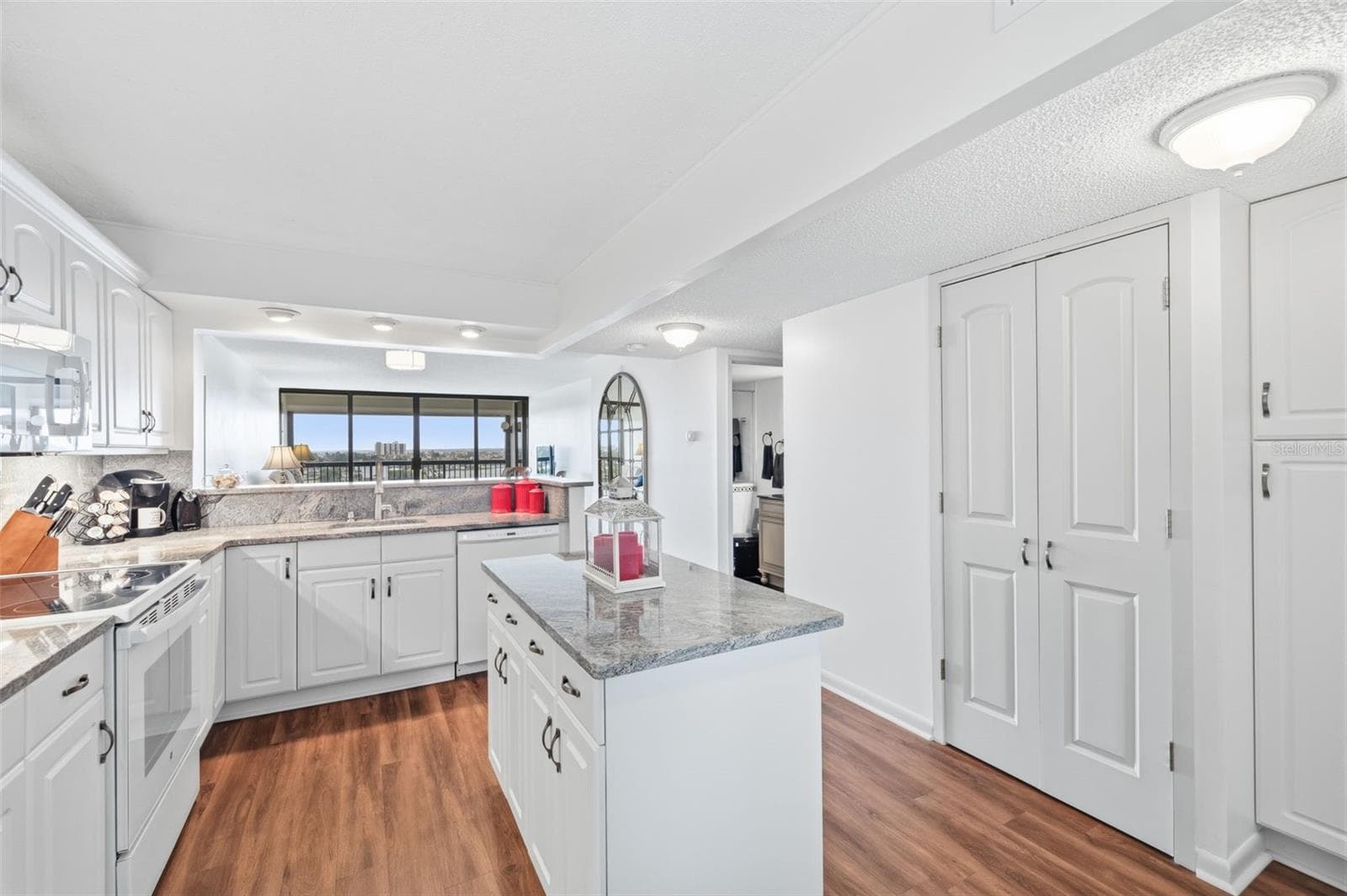 Updated Kitchen with Entry hallway storage - 9425 BLIND PASS RD #705, ST PETE BEACH