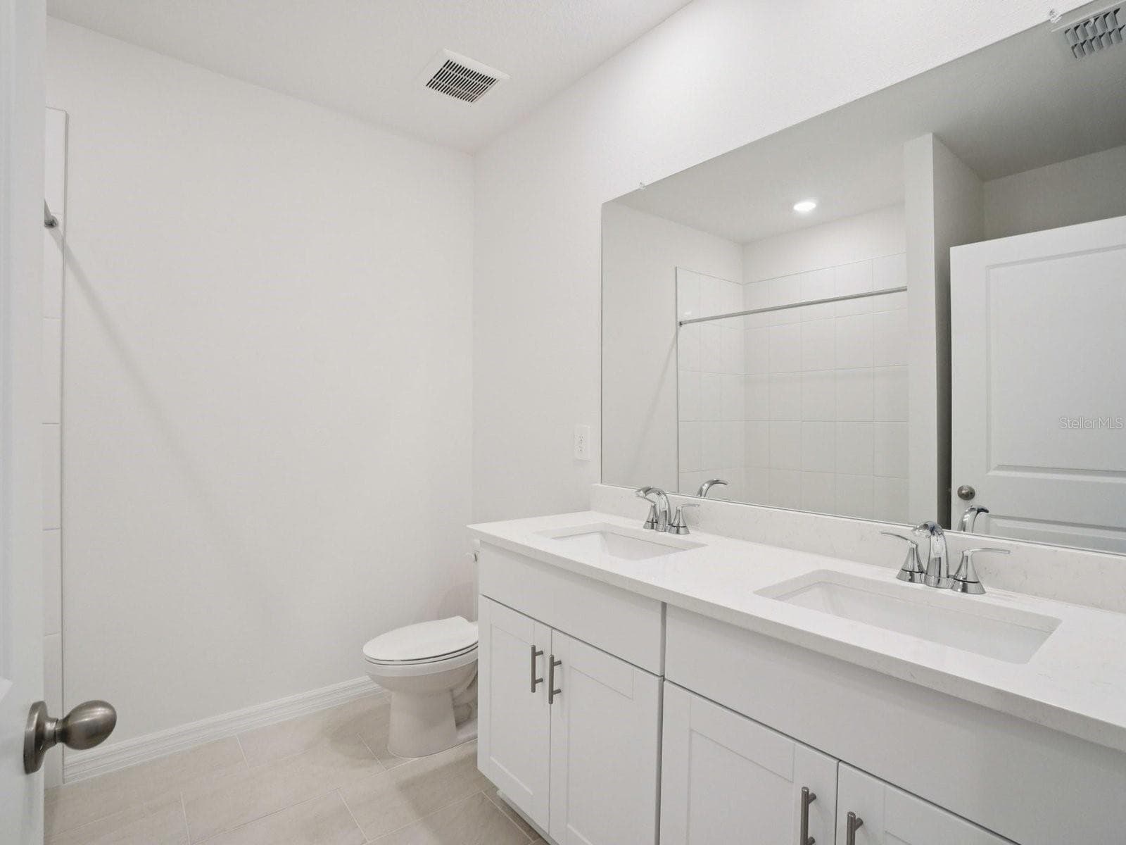 Photo is not of the actual home, but is an inspirational photo of builder’s model home and may depict options, furnishings, and/or decorator features that are not included - 17661 OLIVE THORN DR, BROOKSVILLE