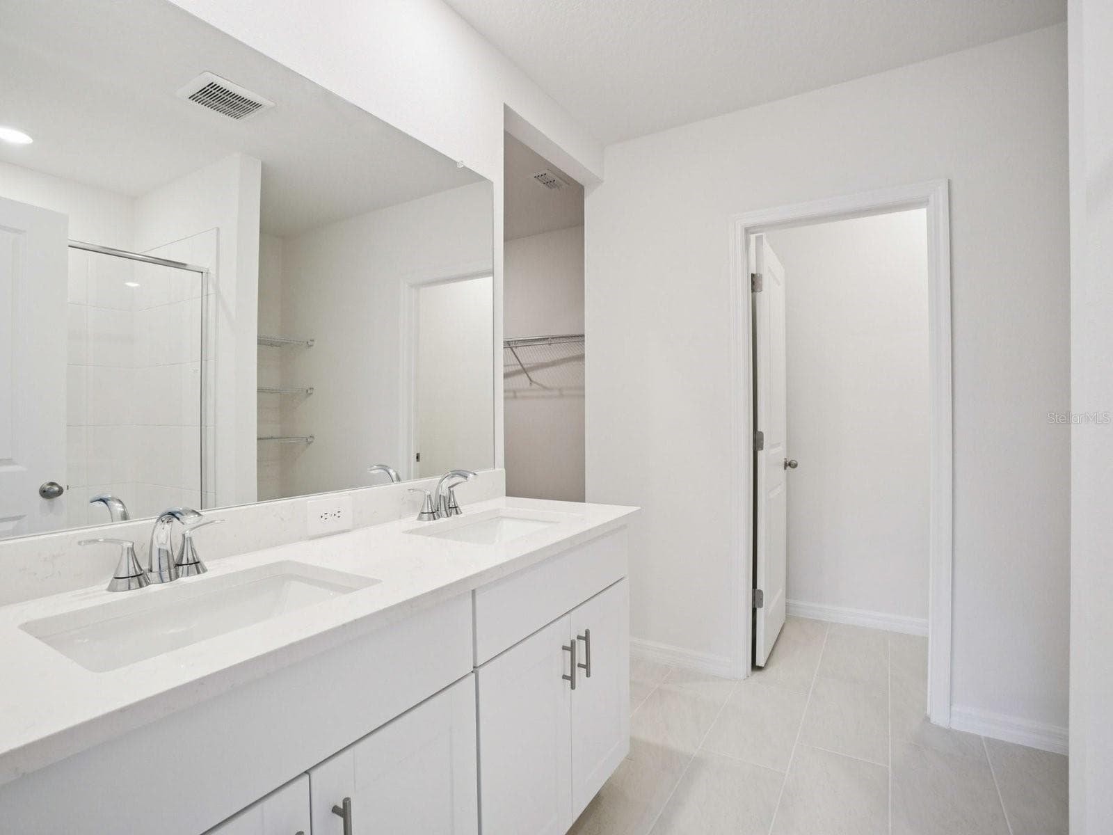 Photo is not of the actual home, but is an inspirational photo of builder’s model home and may depict options, furnishings, and/or decorator features that are not included - 17661 OLIVE THORN DR, BROOKSVILLE