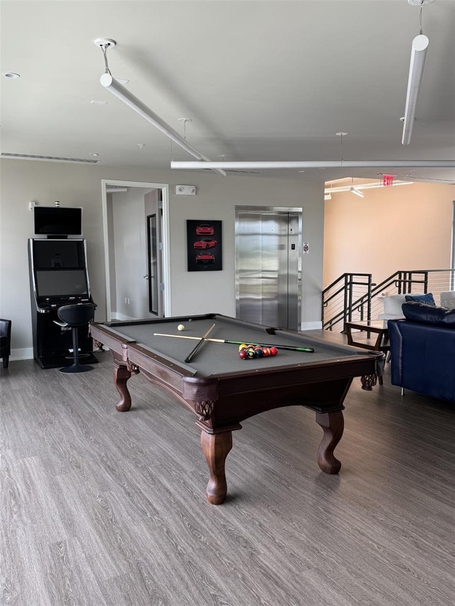 Unwind with a game of pool - 5431 COMMUNICATIONS PKWY #20, SARASOTA