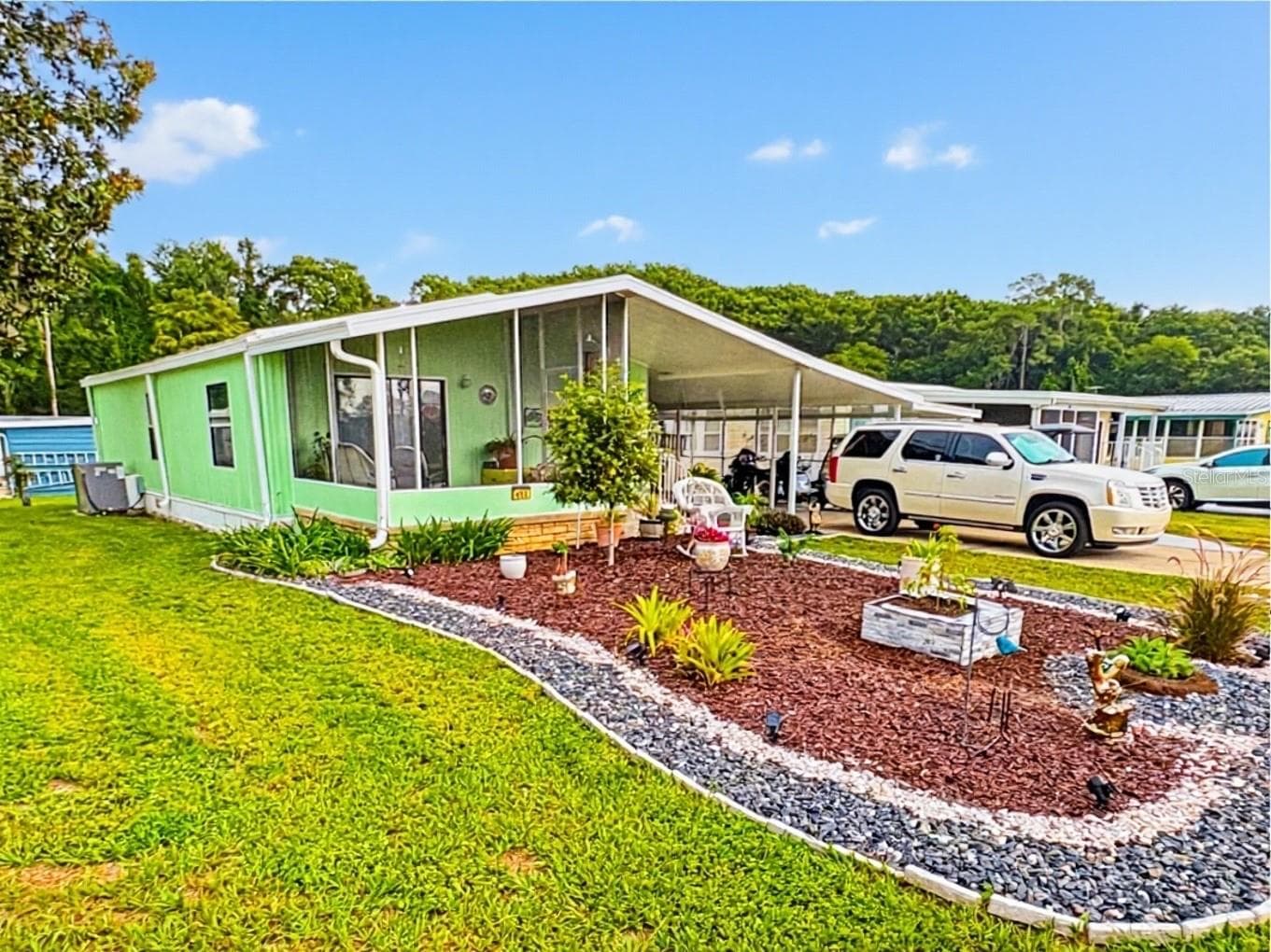 Manufactured Home at 413 S TIMBER TRL, WILDWOOD, photo 2 of 21