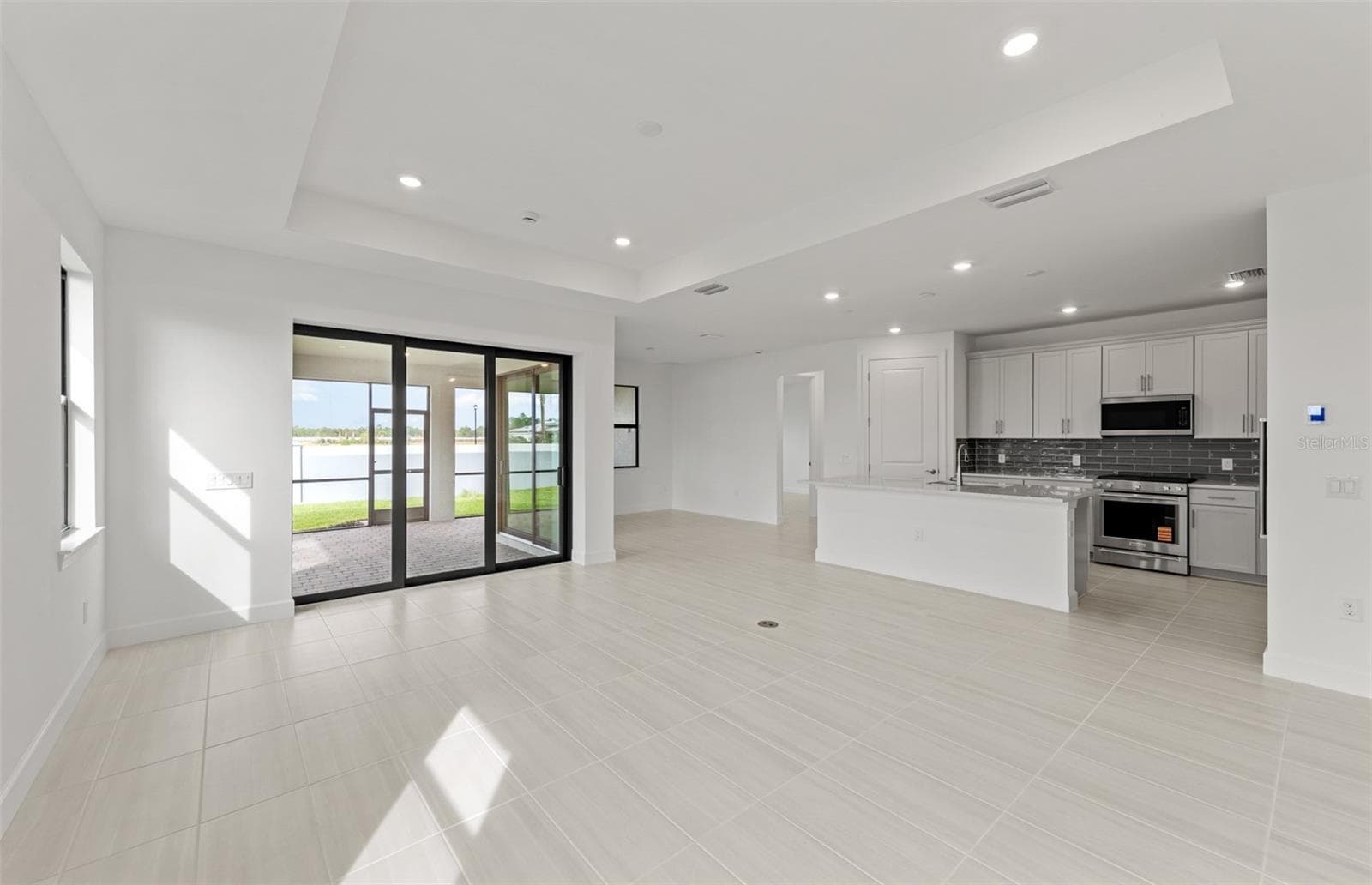Photos are of similar Mystique floorplan. Homes may vary. - 4415 LAKESIDE GROVE, NORTH PORT