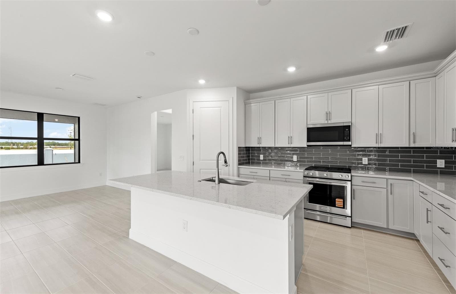 Photos are of similar Mystique floorplan. Homes may vary. - 4415 LAKESIDE GROVE, NORTH PORT