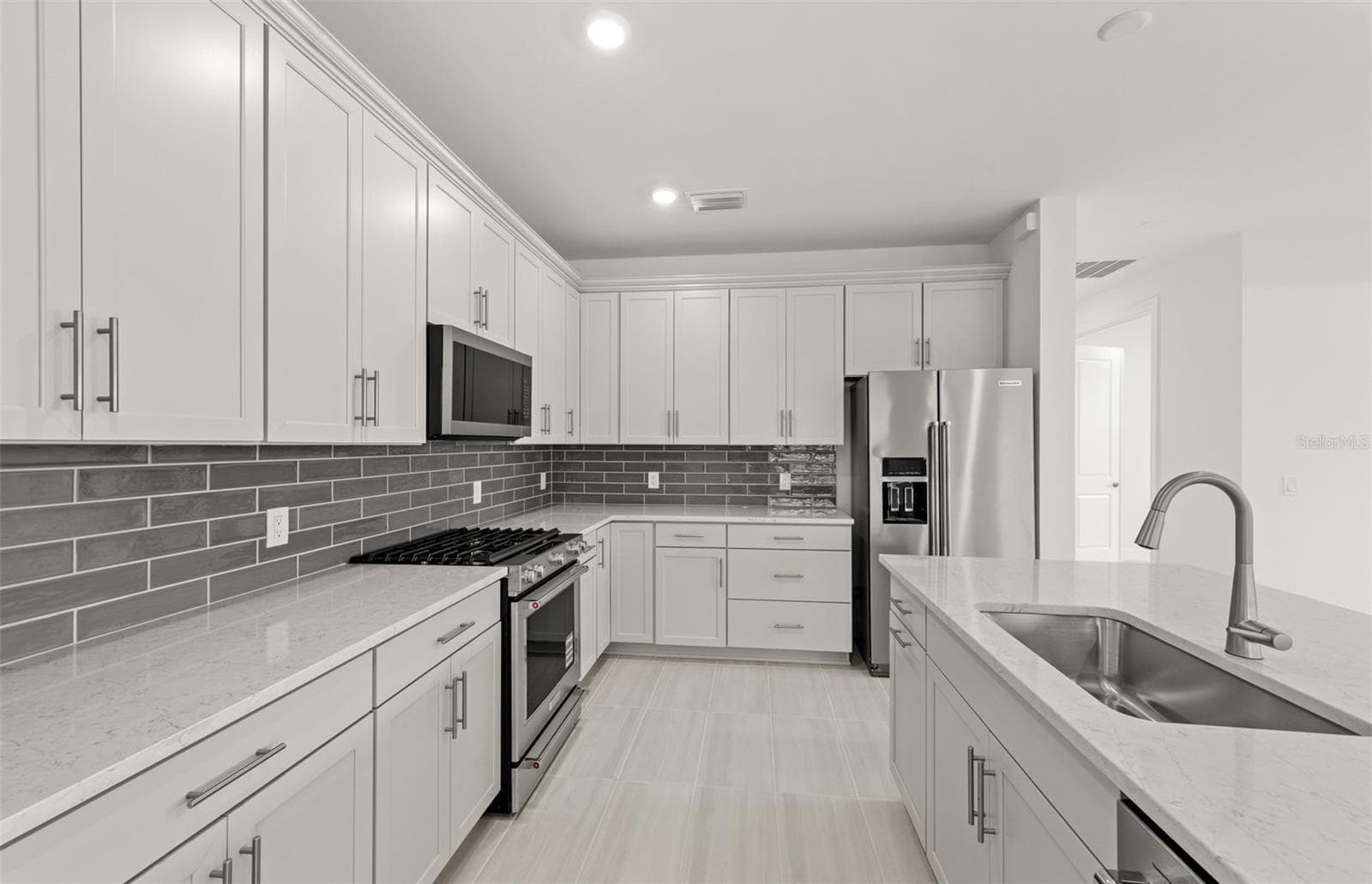 Photos are of similar Mystique floorplan. Homes may vary. - 4415 LAKESIDE GROVE, NORTH PORT