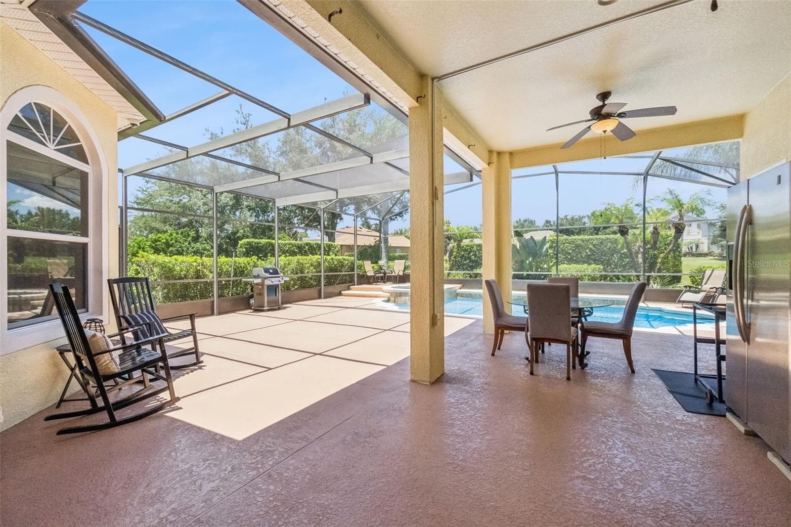 Covered lanai overlooking the screened pool - 1112 CALLAWAY CIR, CLERMONT