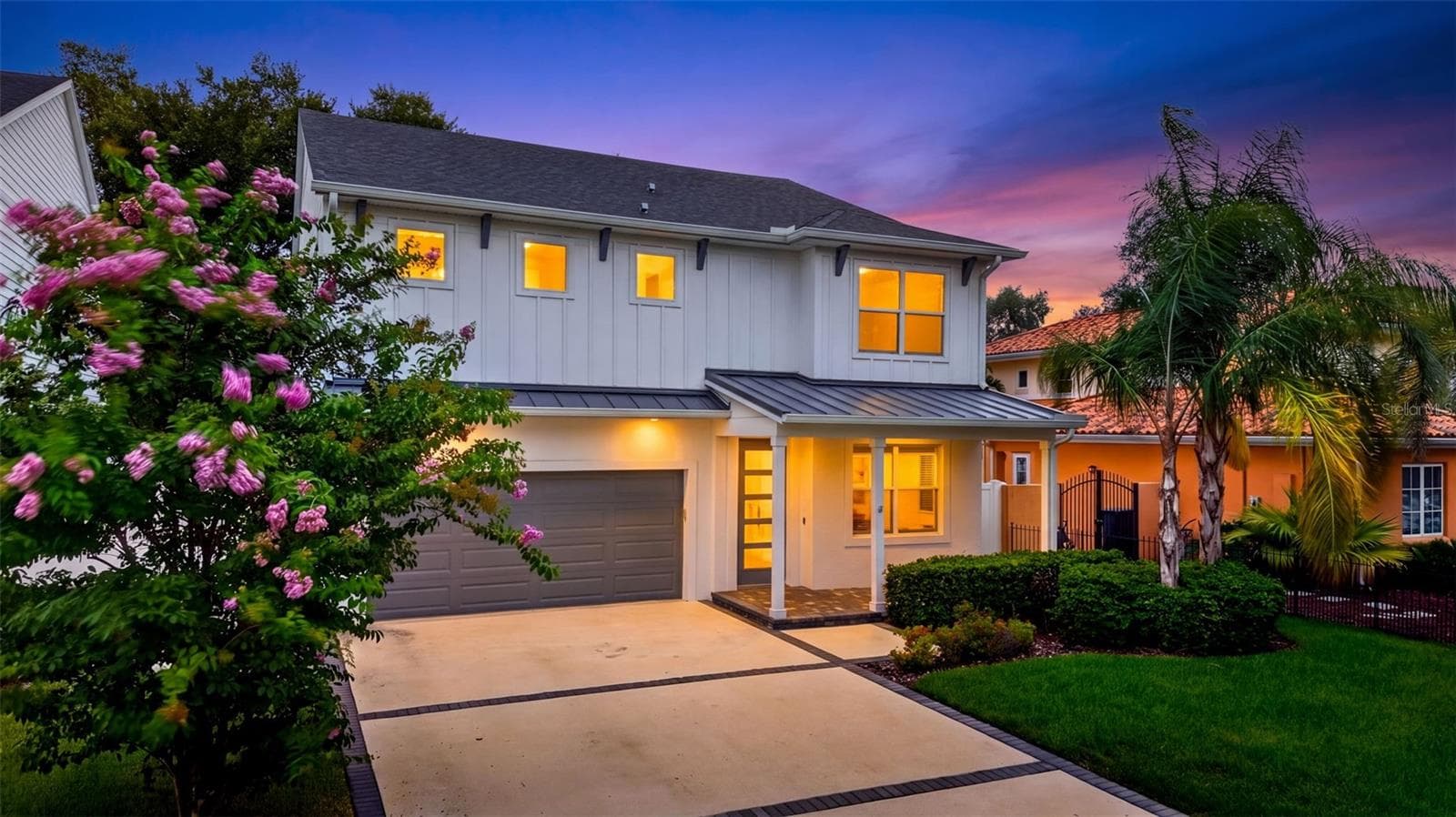 Dusk front view of the home. - 5818 1/2 S 6TH ST, TAMPA