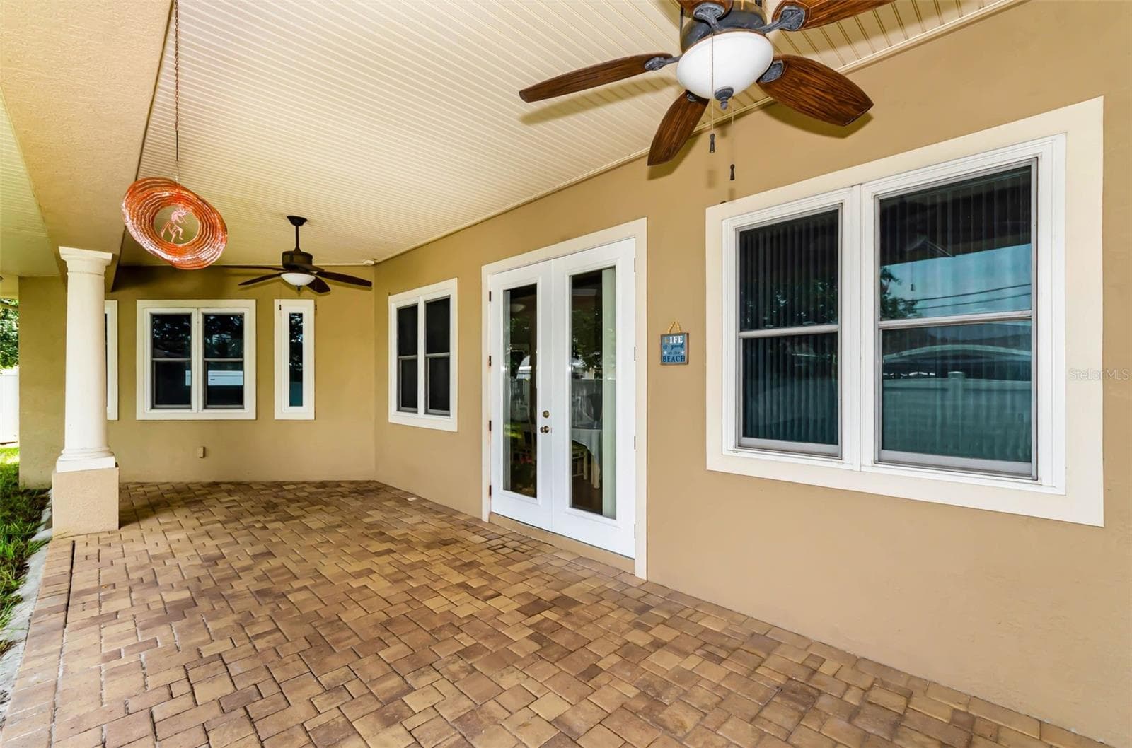 Can you imagine entertaining during the holidays on this beautiful covered paver back porch? - 1888 BUGLE LN, CLEARWATER
