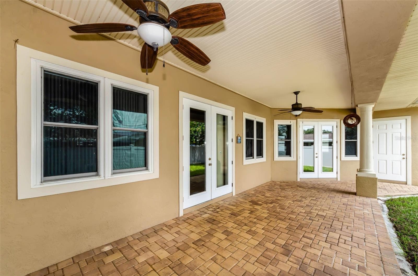 Double Door entry to the living and grand primary bedroom! - 1888 BUGLE LN, CLEARWATER
