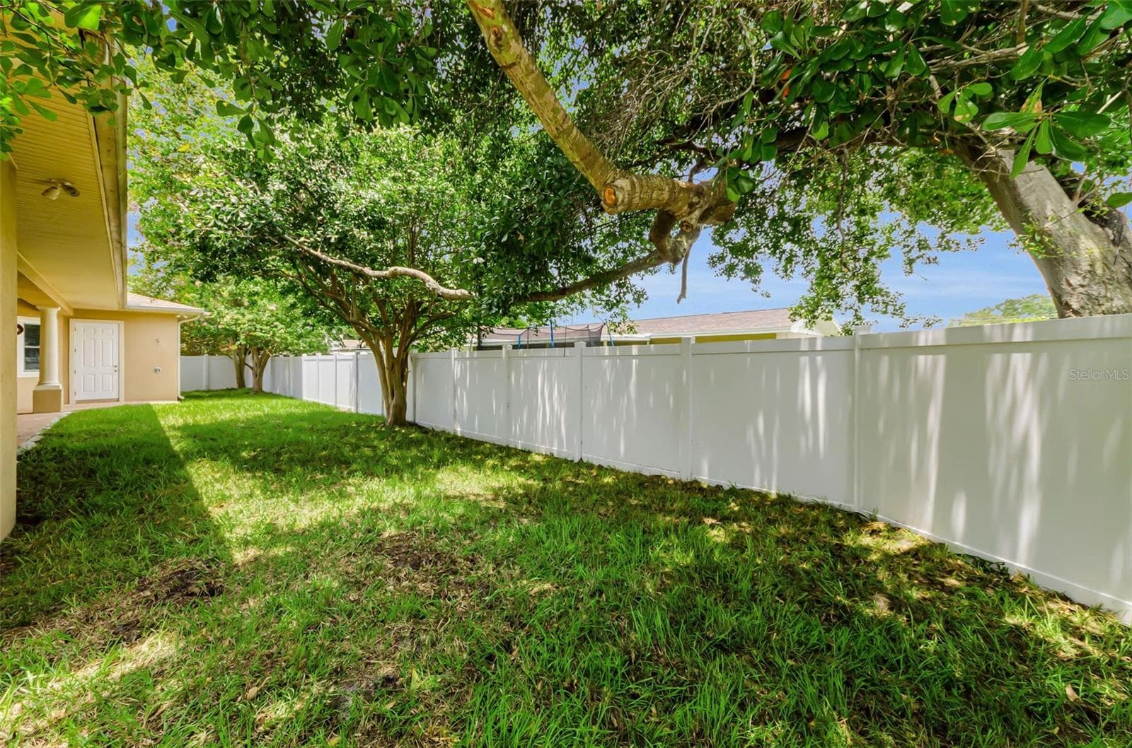 That is the pool bath and outdoor shower at the other end of the house. - 1888 BUGLE LN, CLEARWATER