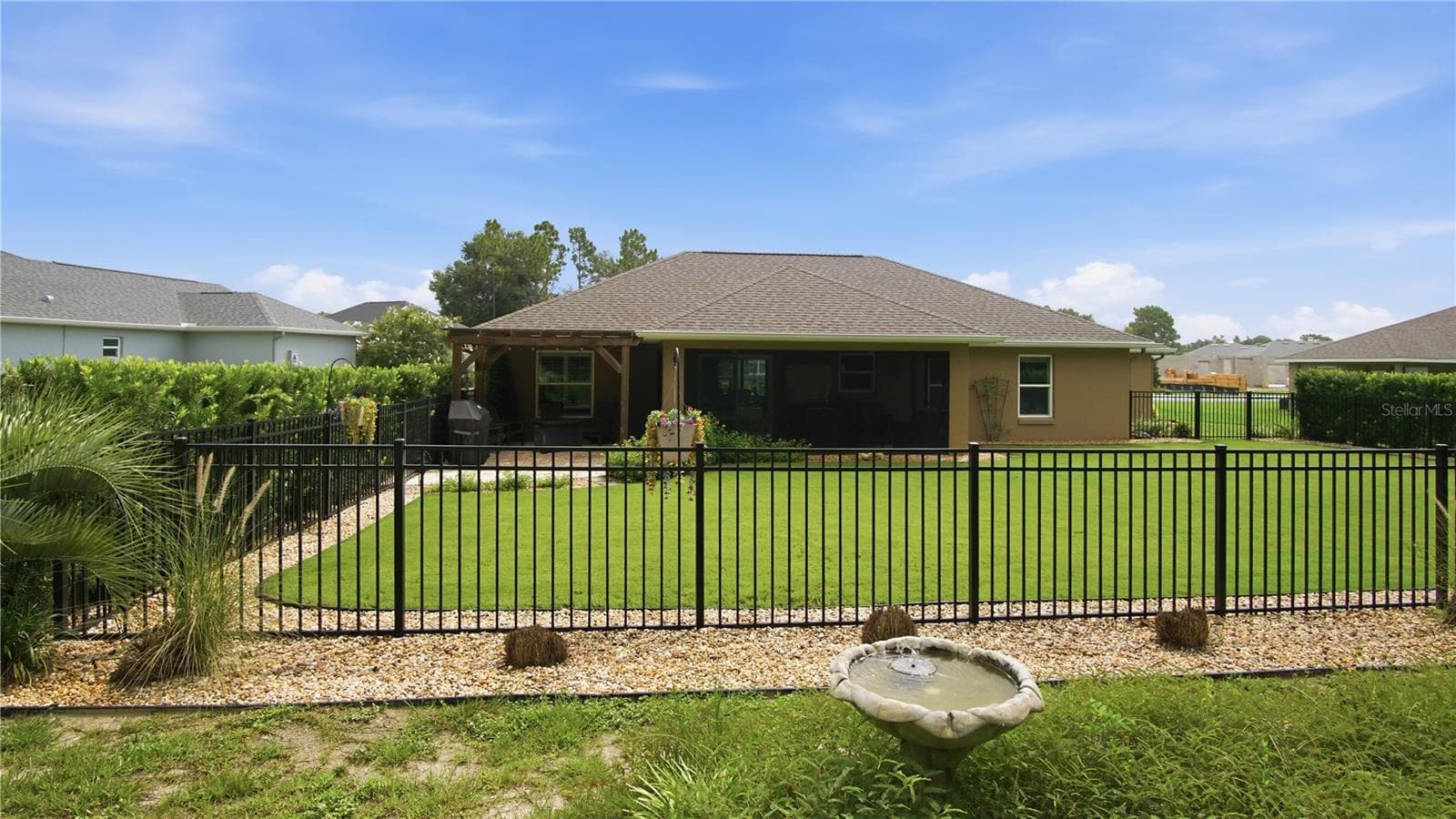 beyond the backgate seating area under oak canopys - 6752 SW 179TH COURT RD, DUNNELLON