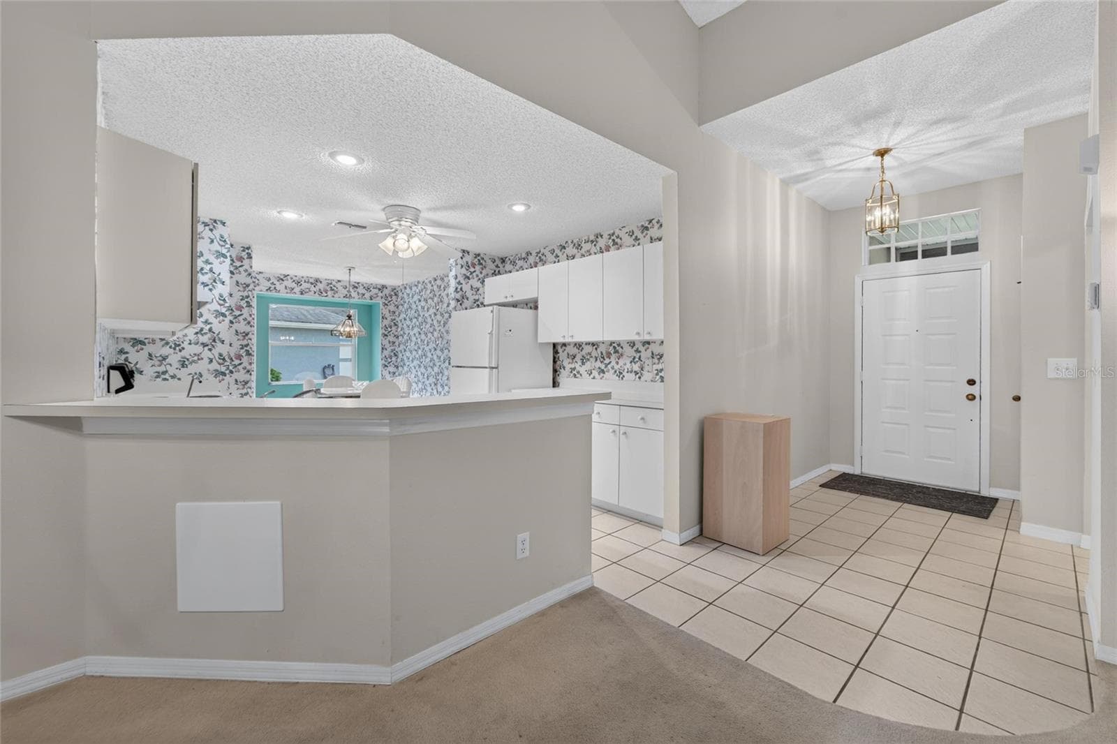 Kitchen and Entryway - 1023 MCDANIEL ST #139, SUN CITY CENTER